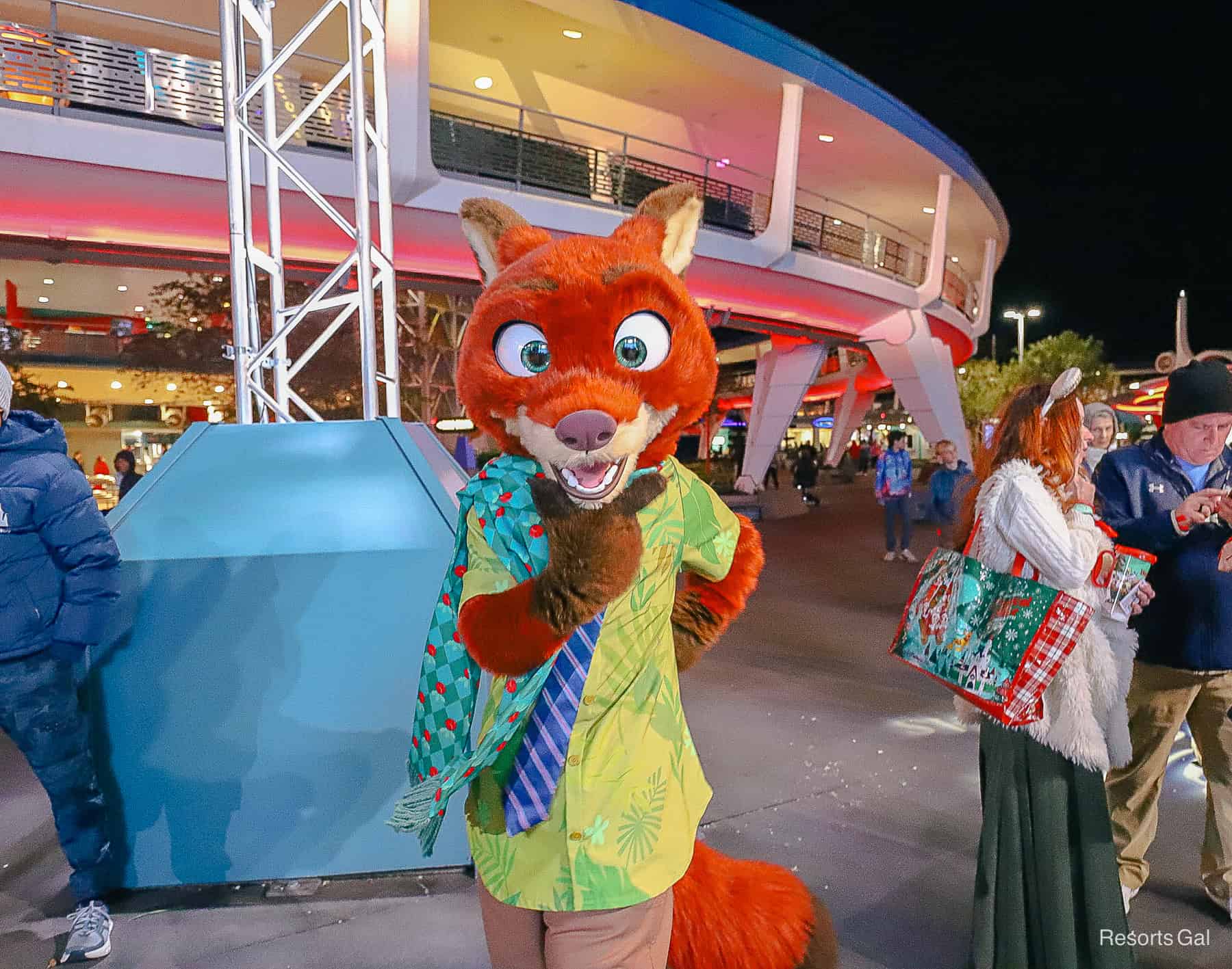 Nick Wilde on the dance floor, wearing a Christmas scarf.