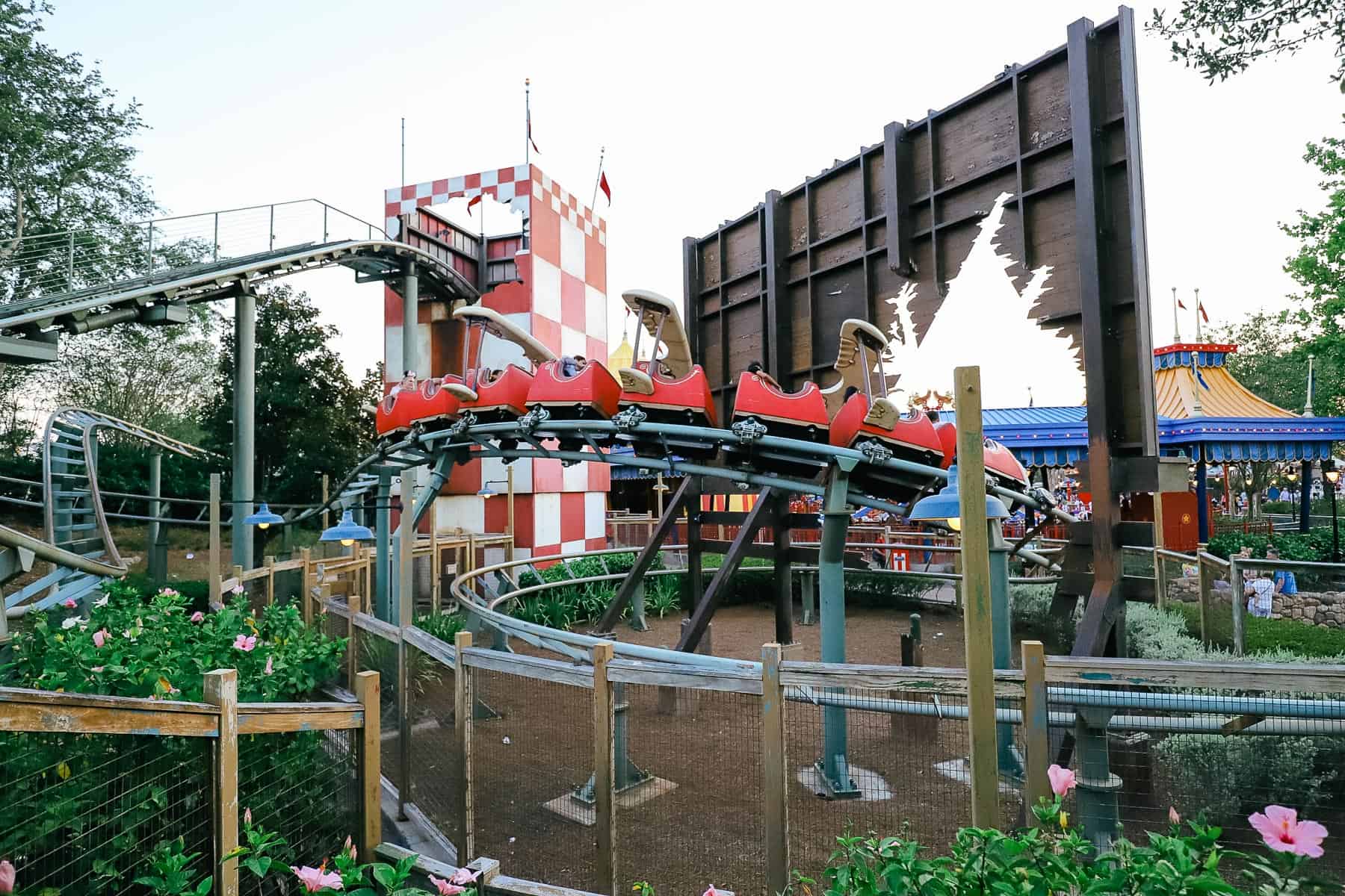 The coaster flying along the tracks as it goes through the billboard. 