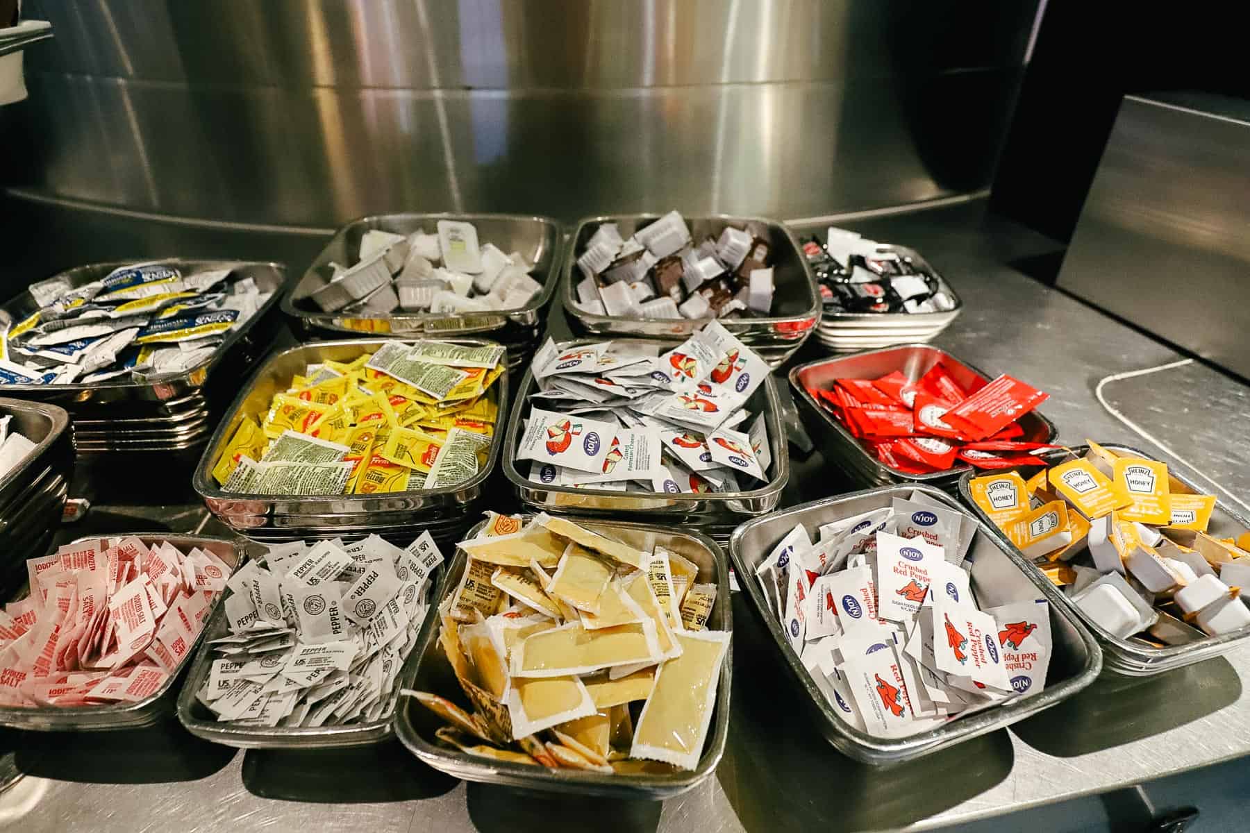packages of condiments, salt, pepper, and more 