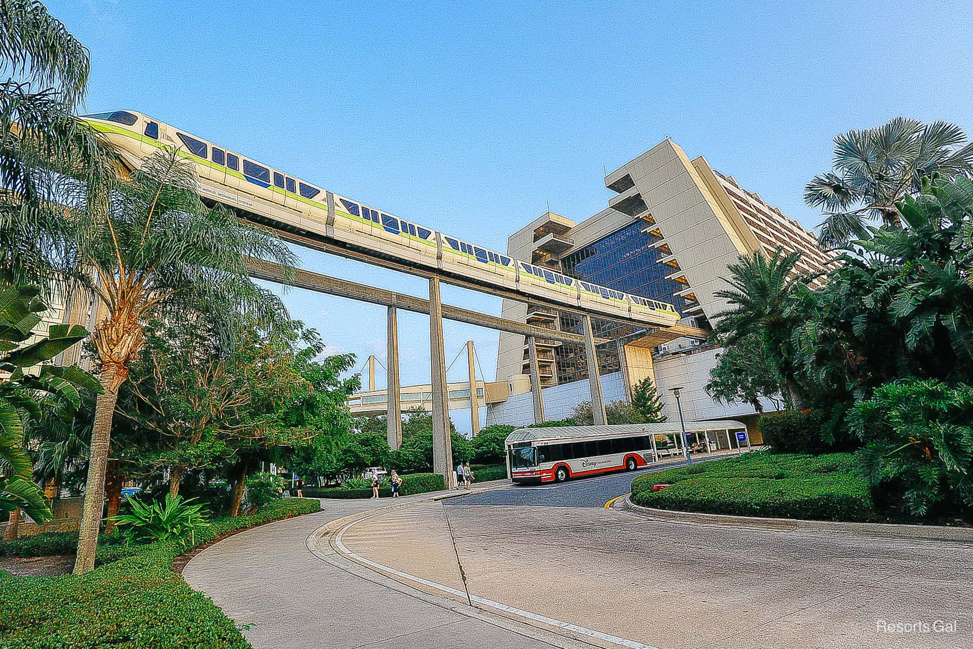 the monorail exits the Contemporary over the walkway to Magic Kingdom 
