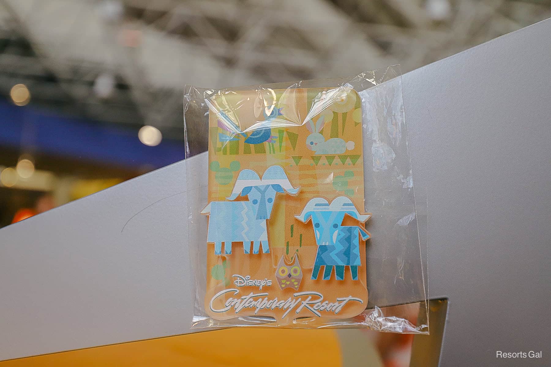 a magnet with a raised 3-legged goat representing Disney's Contemporary Resort