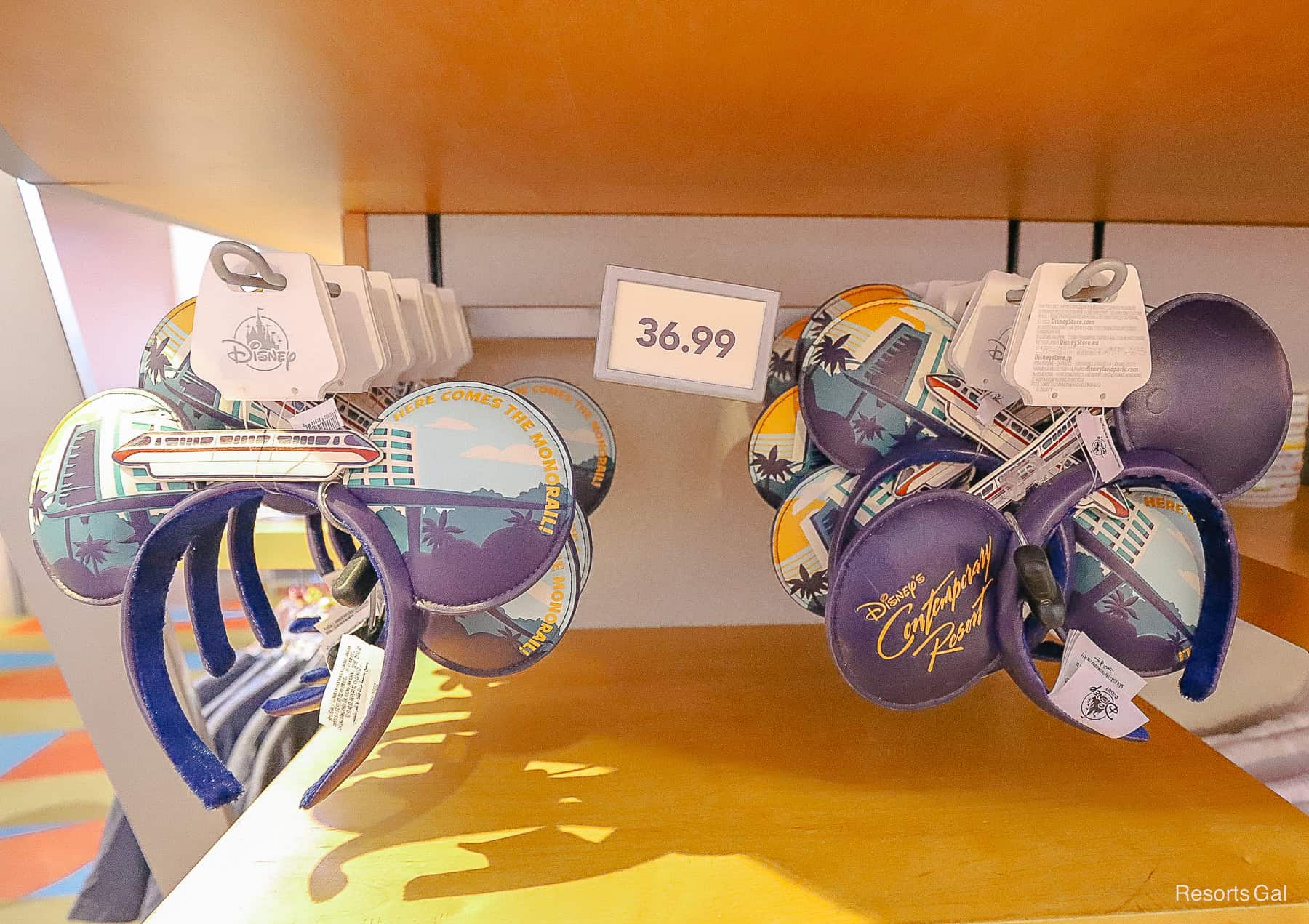 two pairs of Minnie Ears themed to the Contemporary with a resort logo