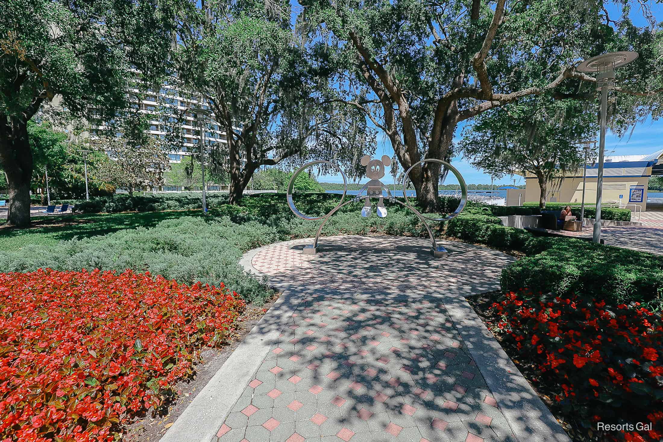 a statue of Mickey that guests can sit on or stand by for a photo spot at Disney's Contemporary Resort 