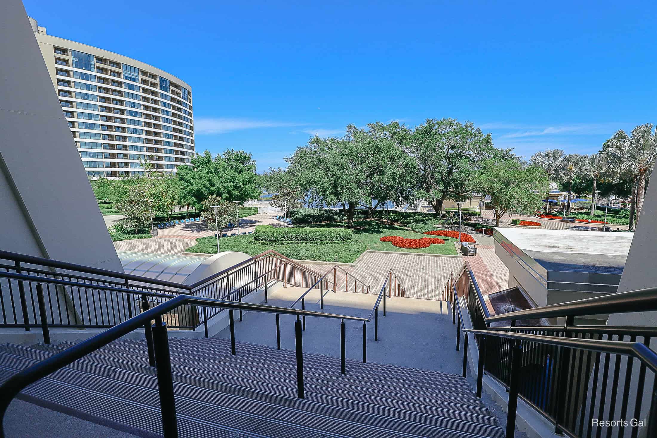 a staircase that leads down from the resort's third floor to the Contemporary's backyard 