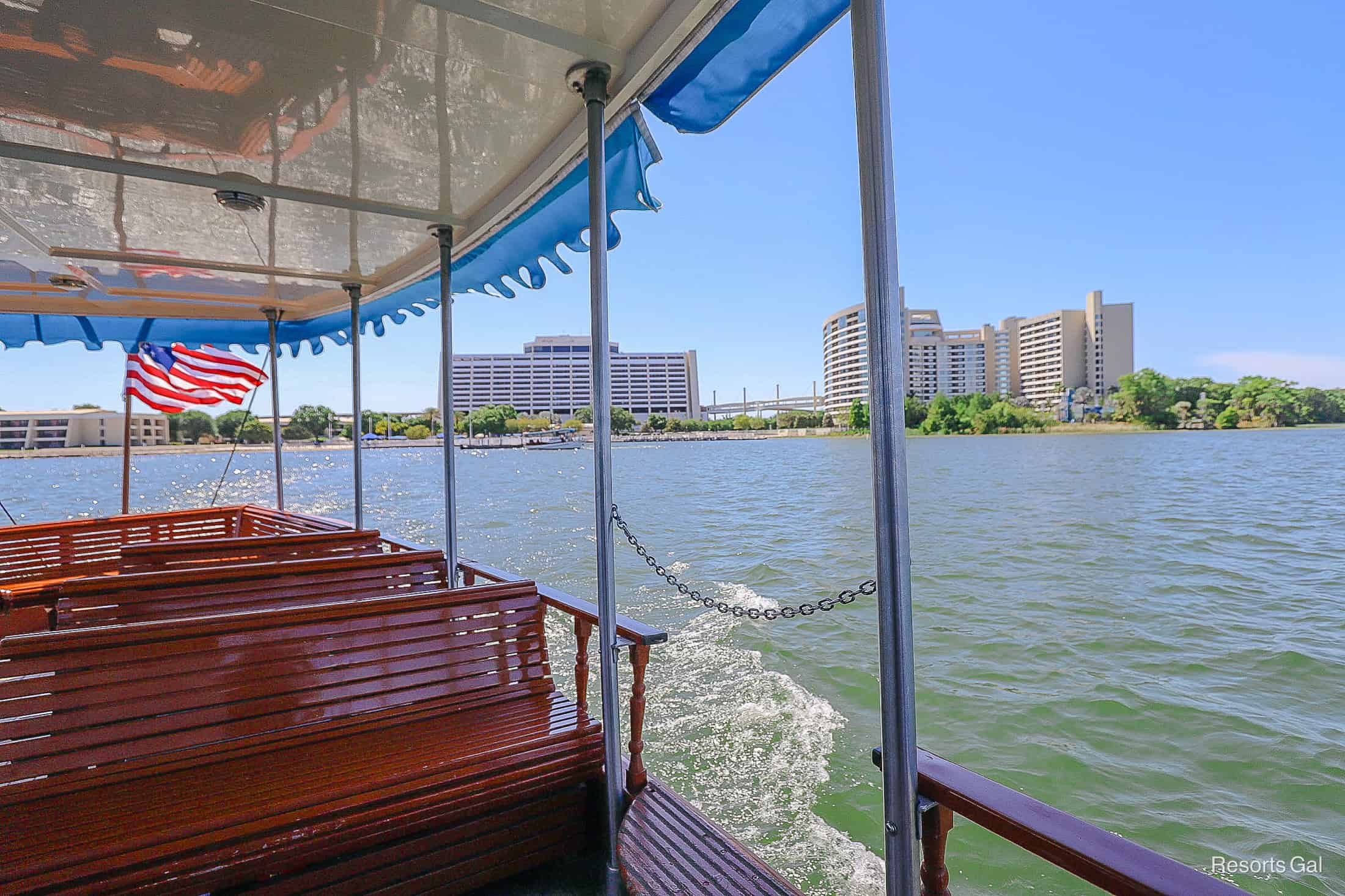 a view of the Contemporary and Bay Lake Tower from a boat on Bay Lake 