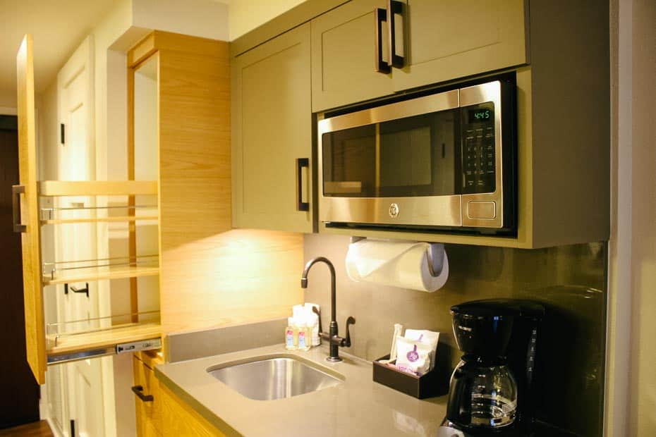 a microwave, sink, and coffee maker in Copper Creek Villas room
