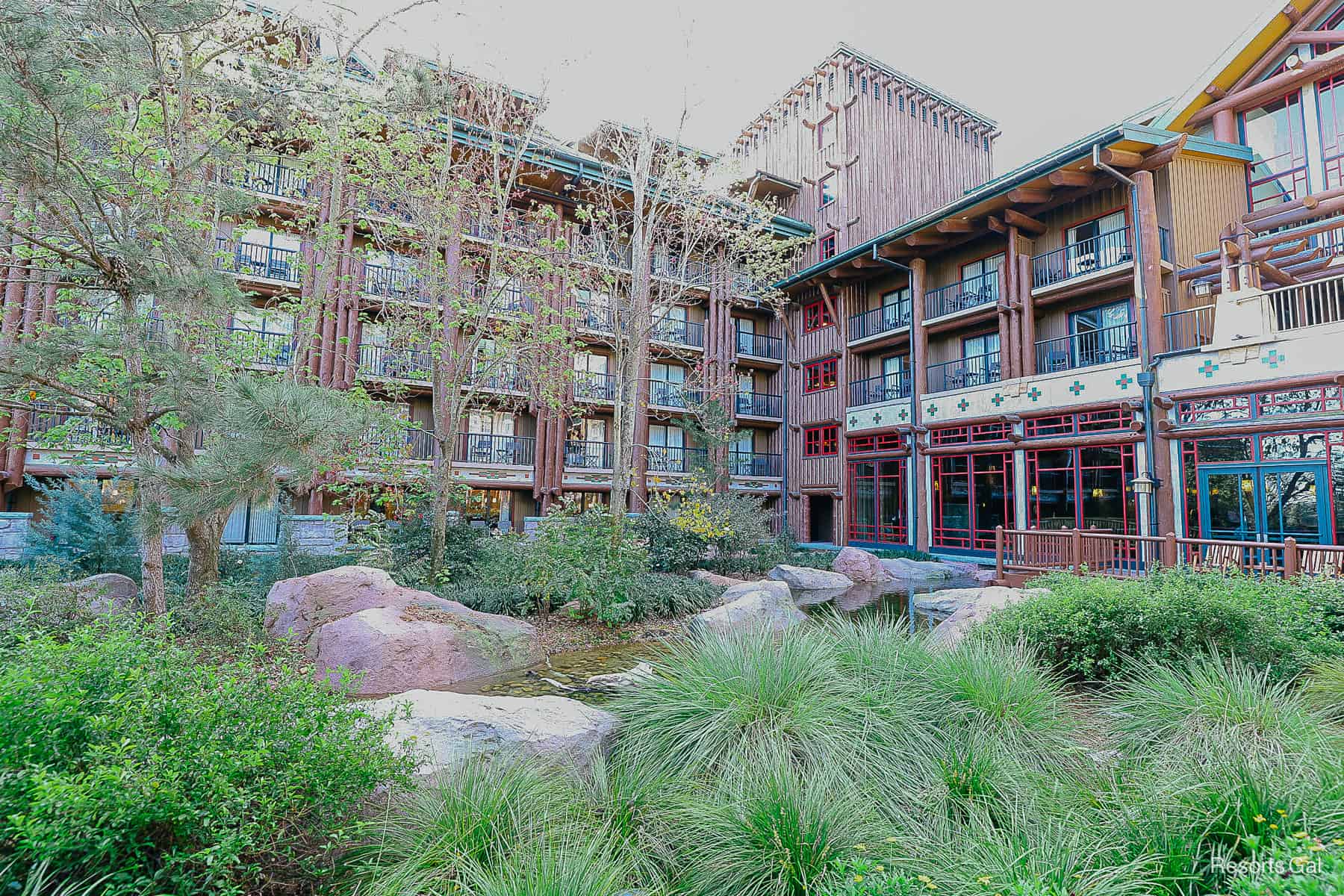 green landscaping and trees in bloom around the Copper Creek Villas 