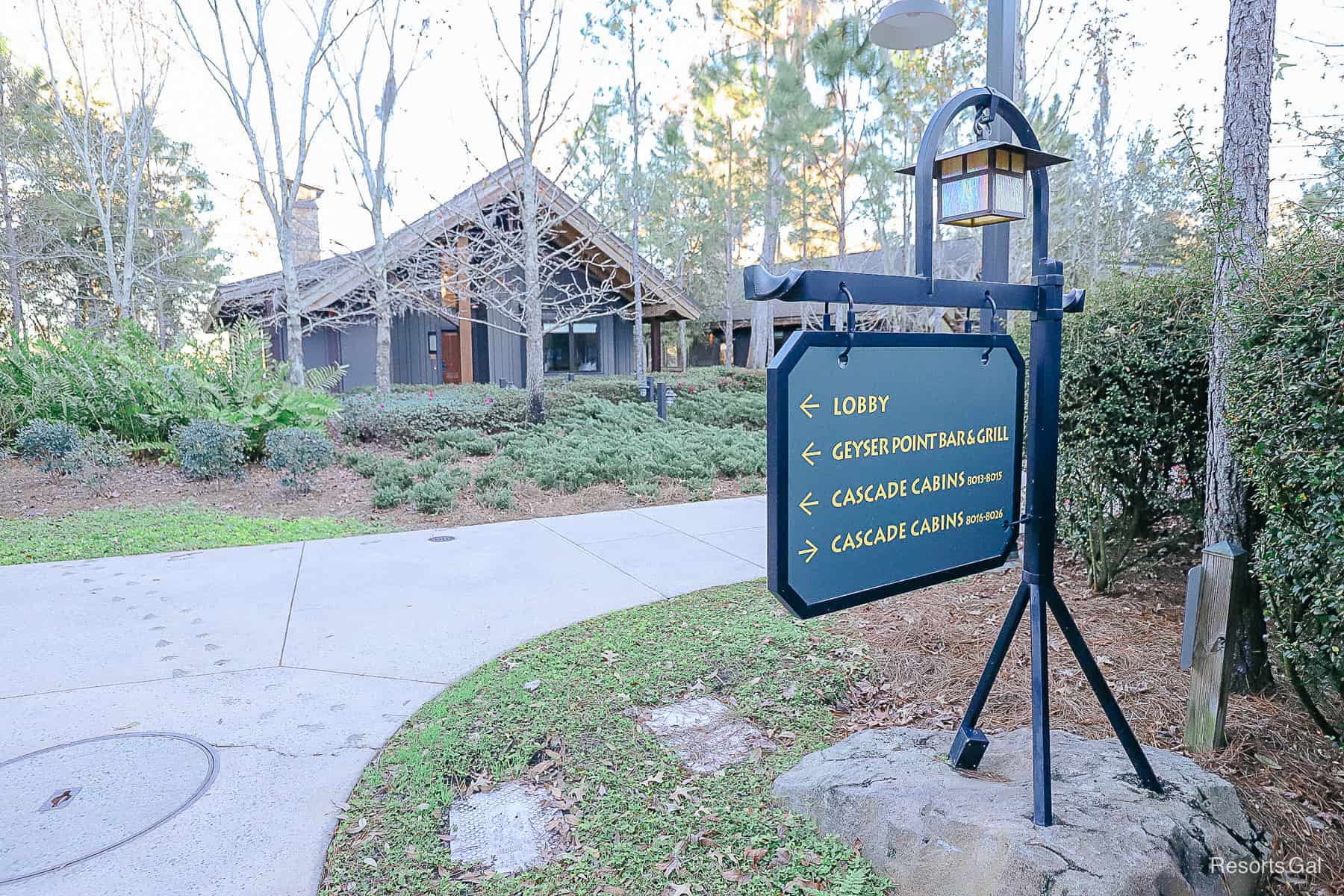 a directional sign on the grounds of Disney's Wilderness Lodge 