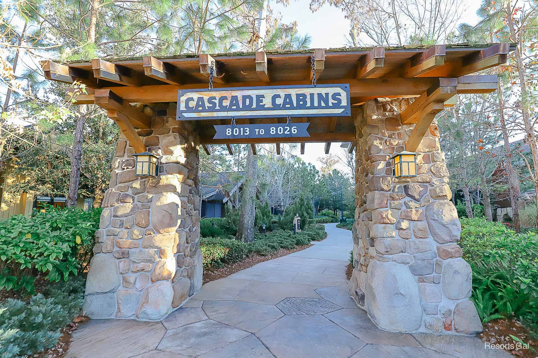 the entrance to the Cascade Cabins area with stacked stone columns 