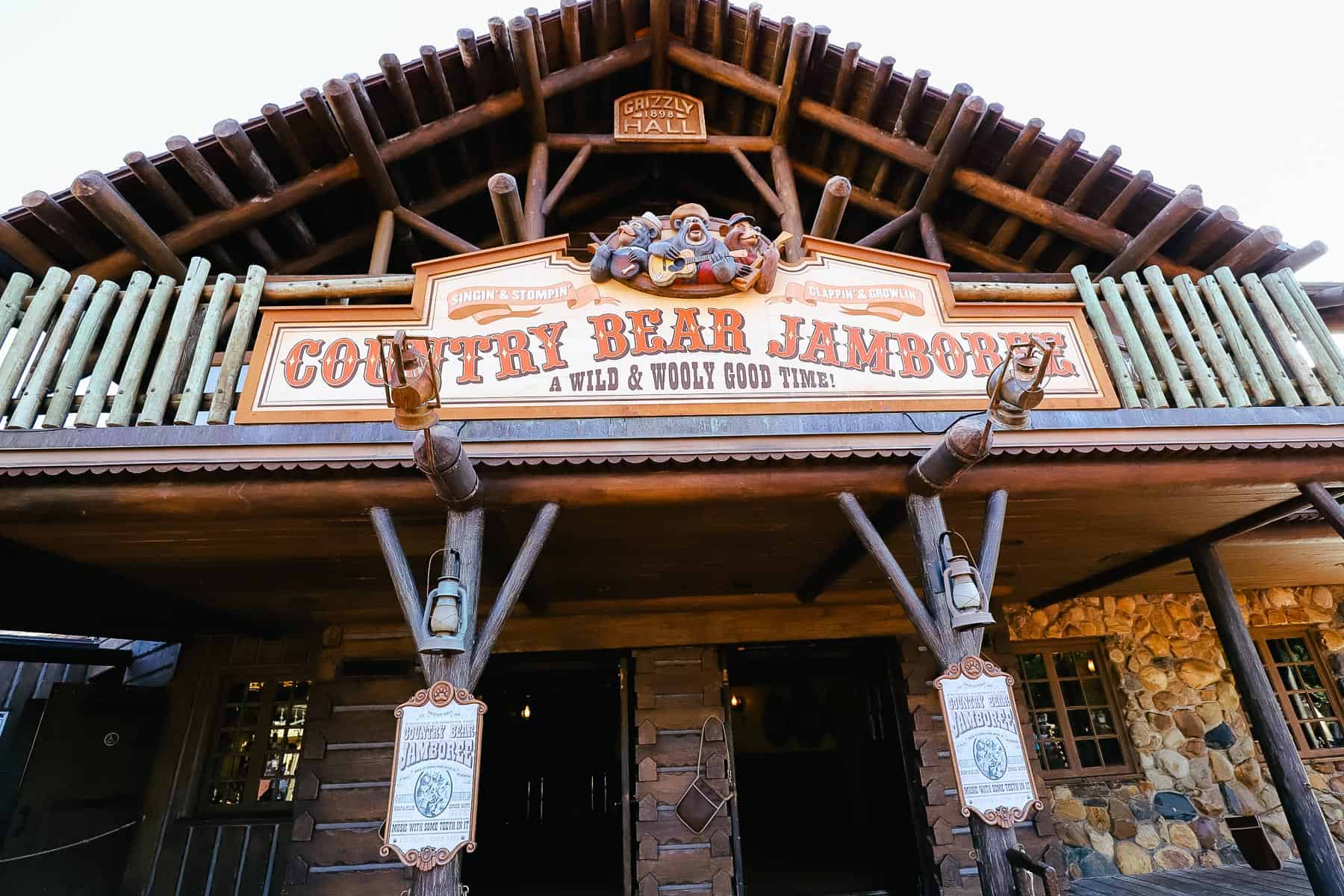 Sign over the Country Bear Jamboree says A Wild and Wooly Good Time! 