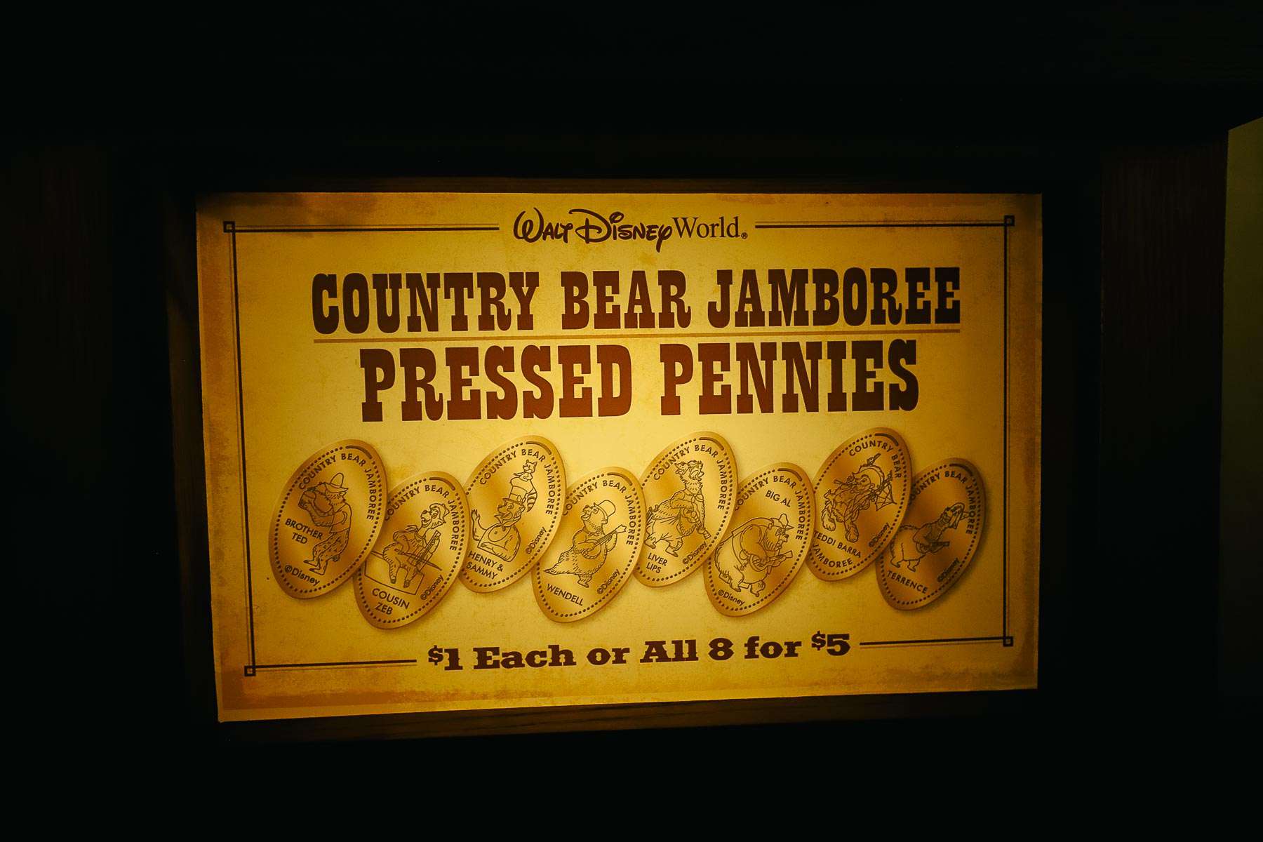 a pressed penny machine in the lobby of the Country Bear Jamboree
