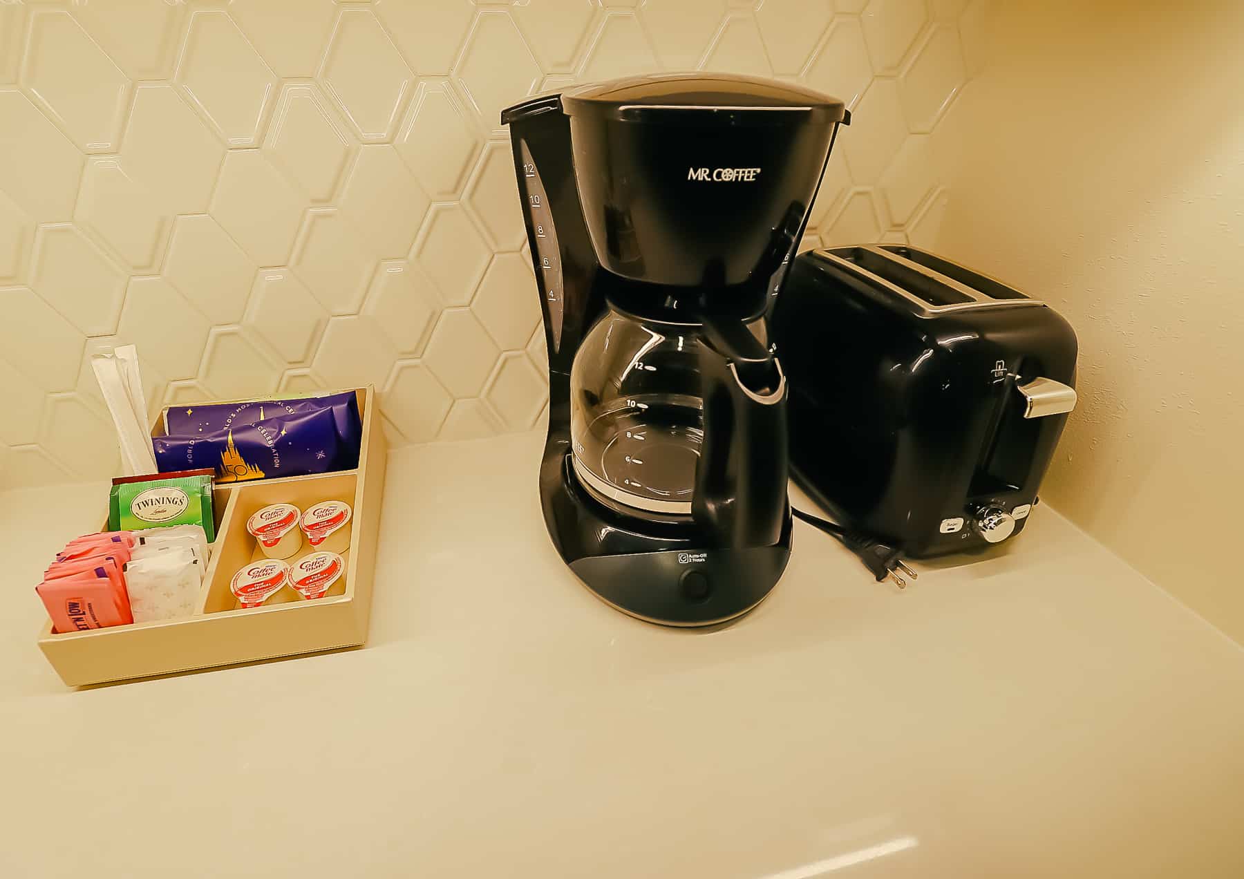 coffee maker, accompaniments, toaster oven 