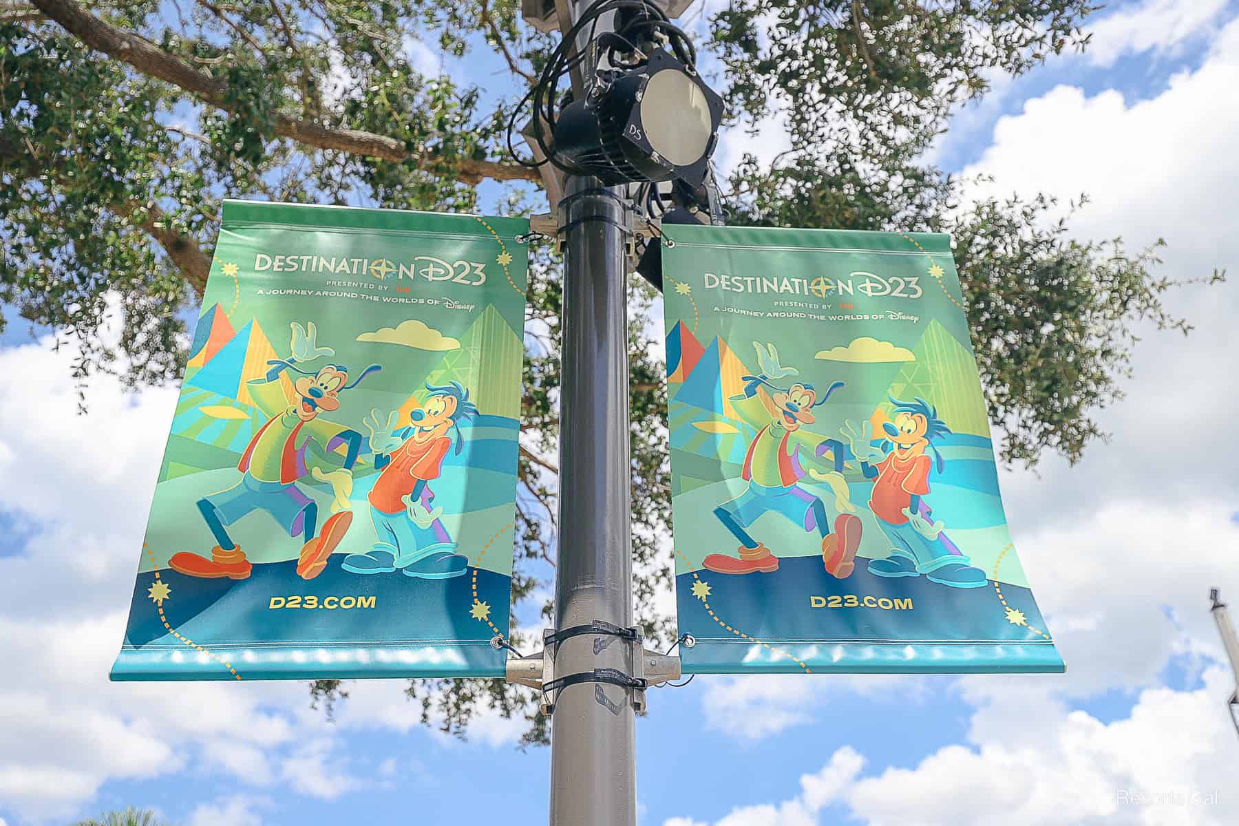 banners advertising the Destination D23 event at Walt Disney World