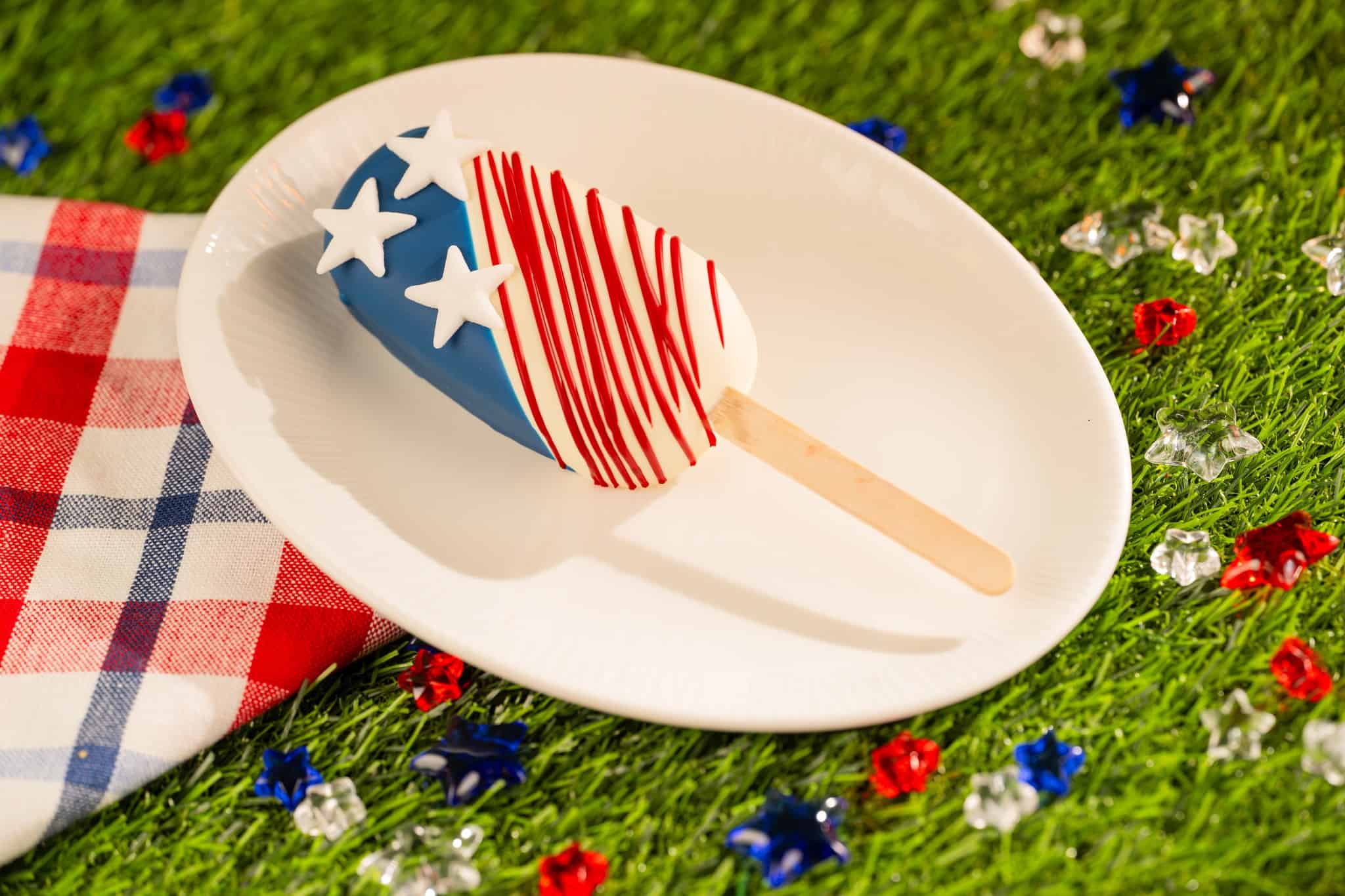 a patriotic pop on a white plate