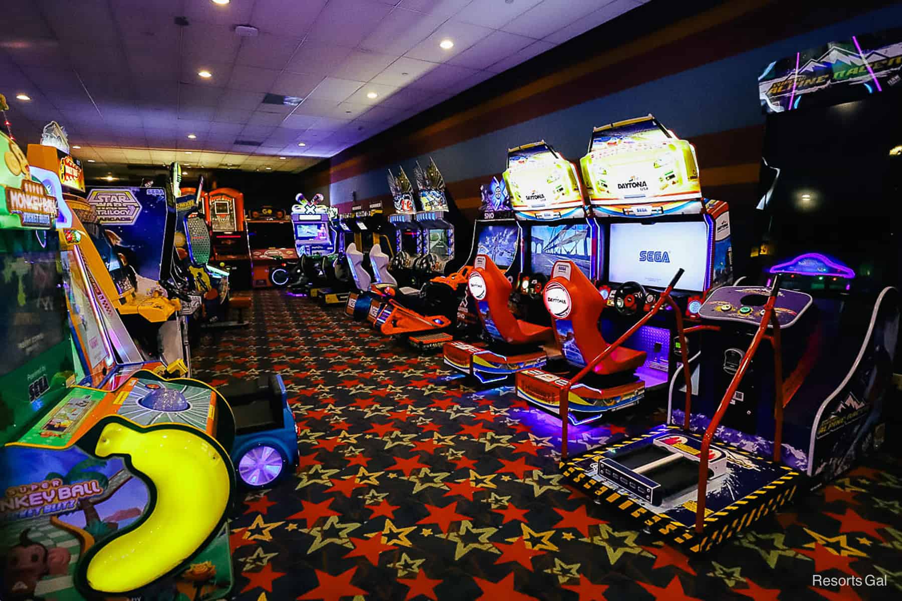 interior of the arcade with rows of video games 