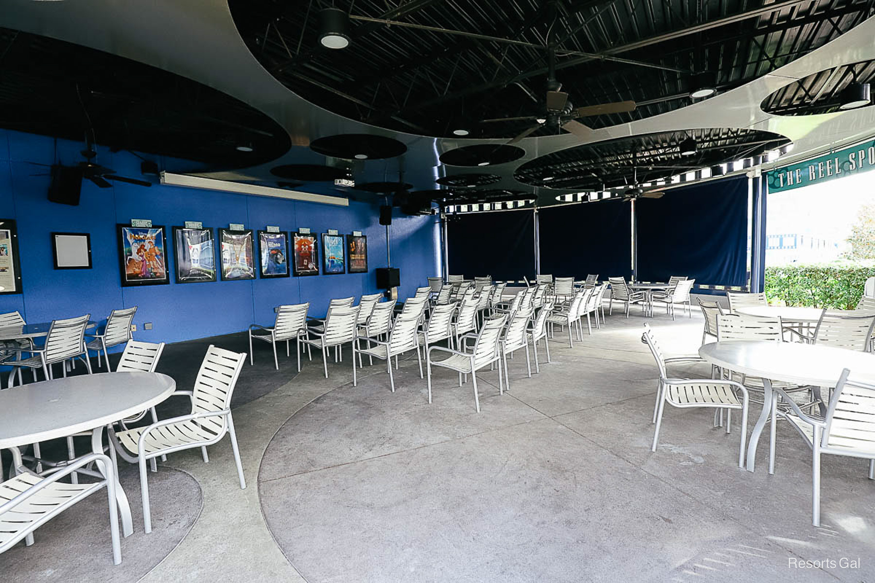 chairs inside the Reel Spot where guests can sit to watch the nightly movie 