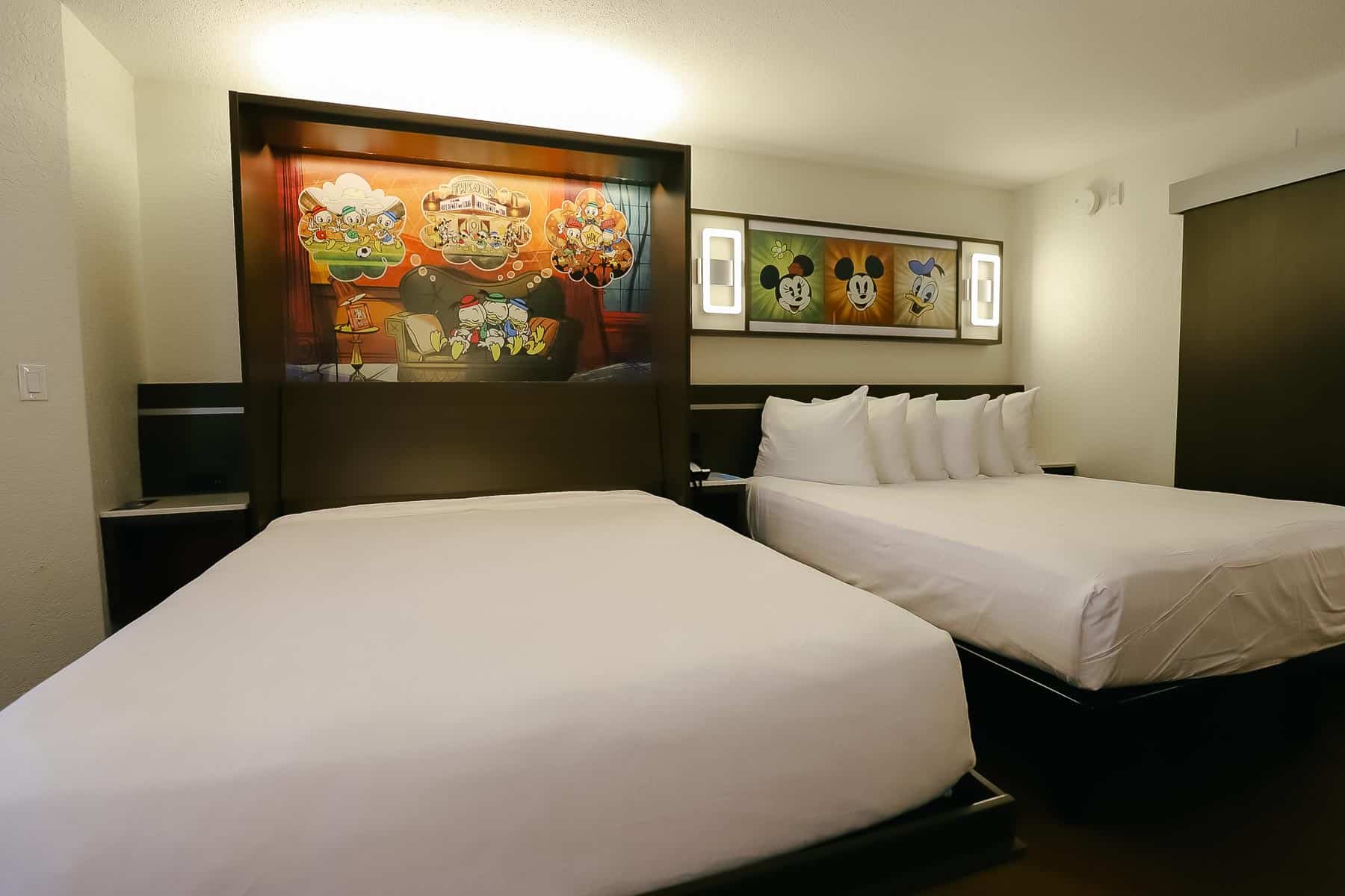 shows both queen-size beds in the room at Disney's All-Star Music. 