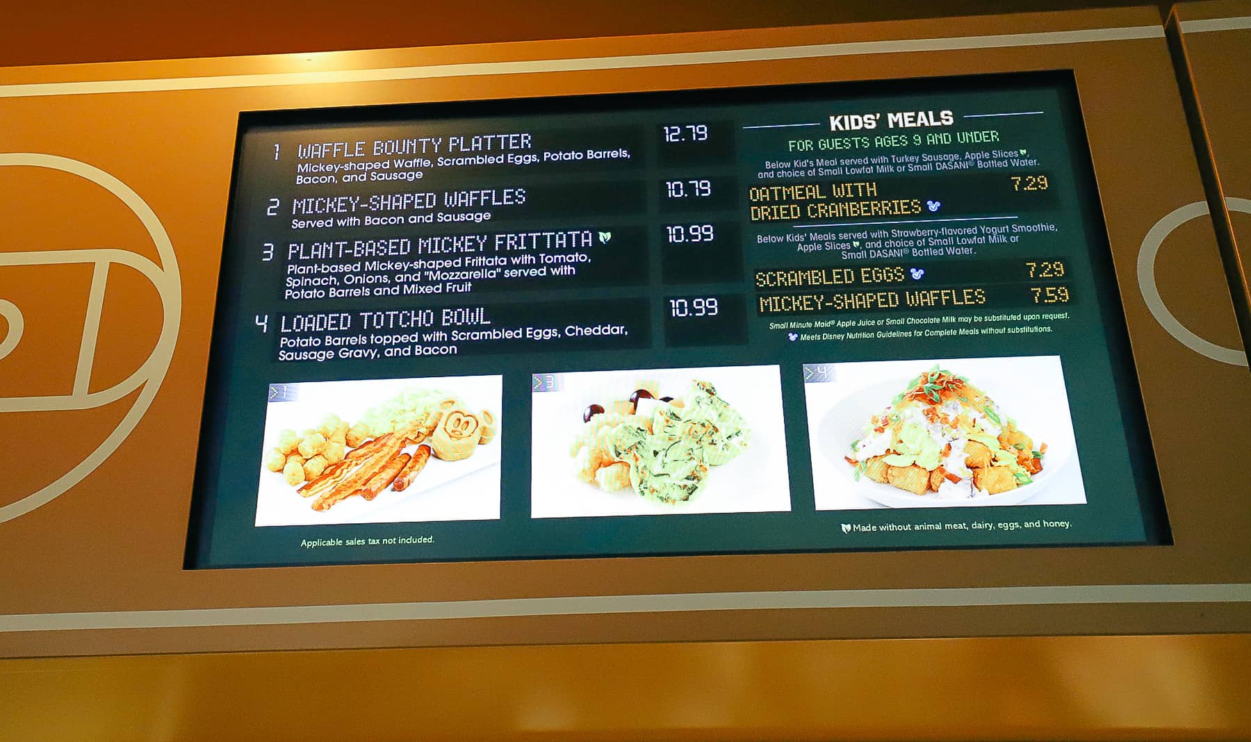 Breakfast Menu Board at End Zone Food Court with Mickey Waffles and Plant-Based Mickey Frittata 