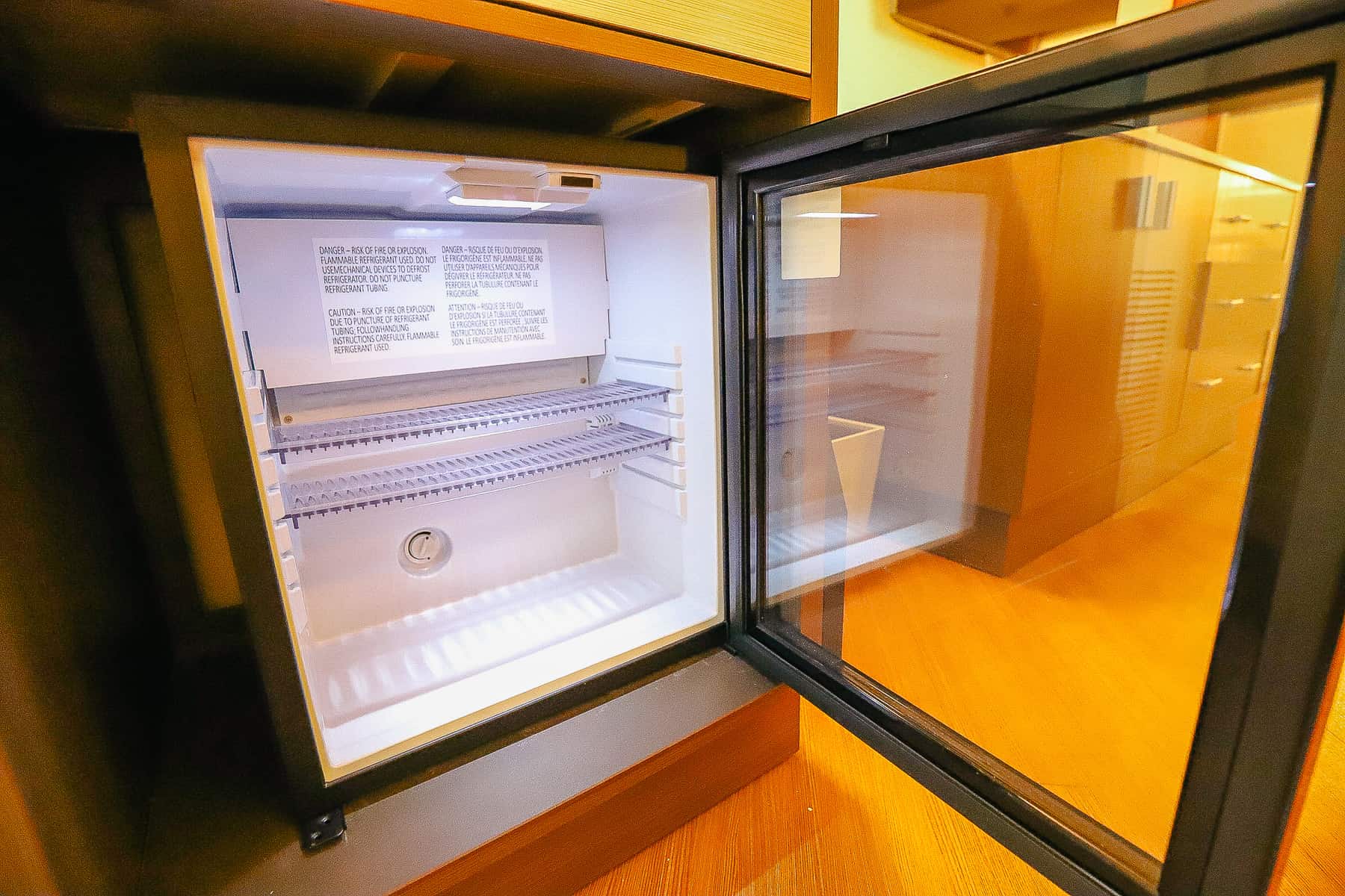 a beverage cooler with glass front doors 