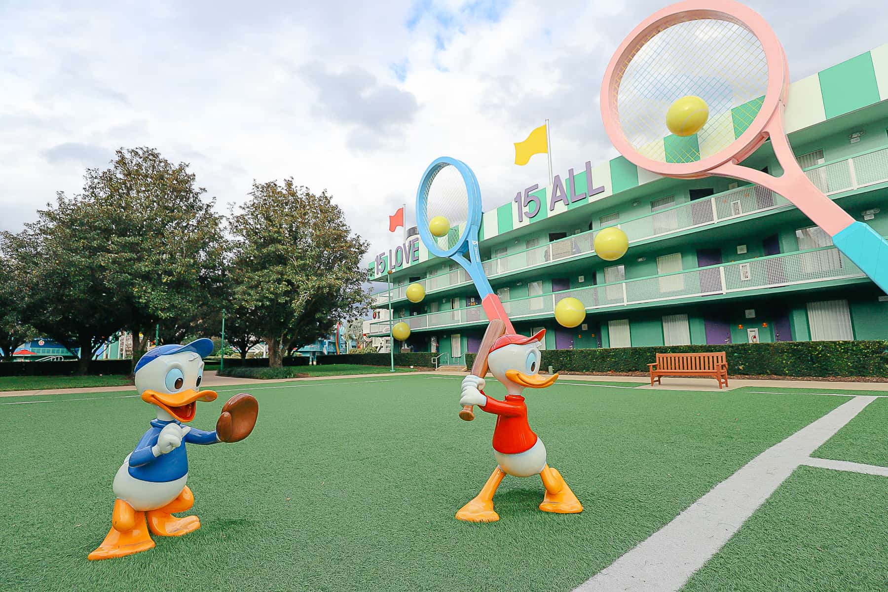 Donald's nephews playing ball on the tennis court at All-Star Sports.