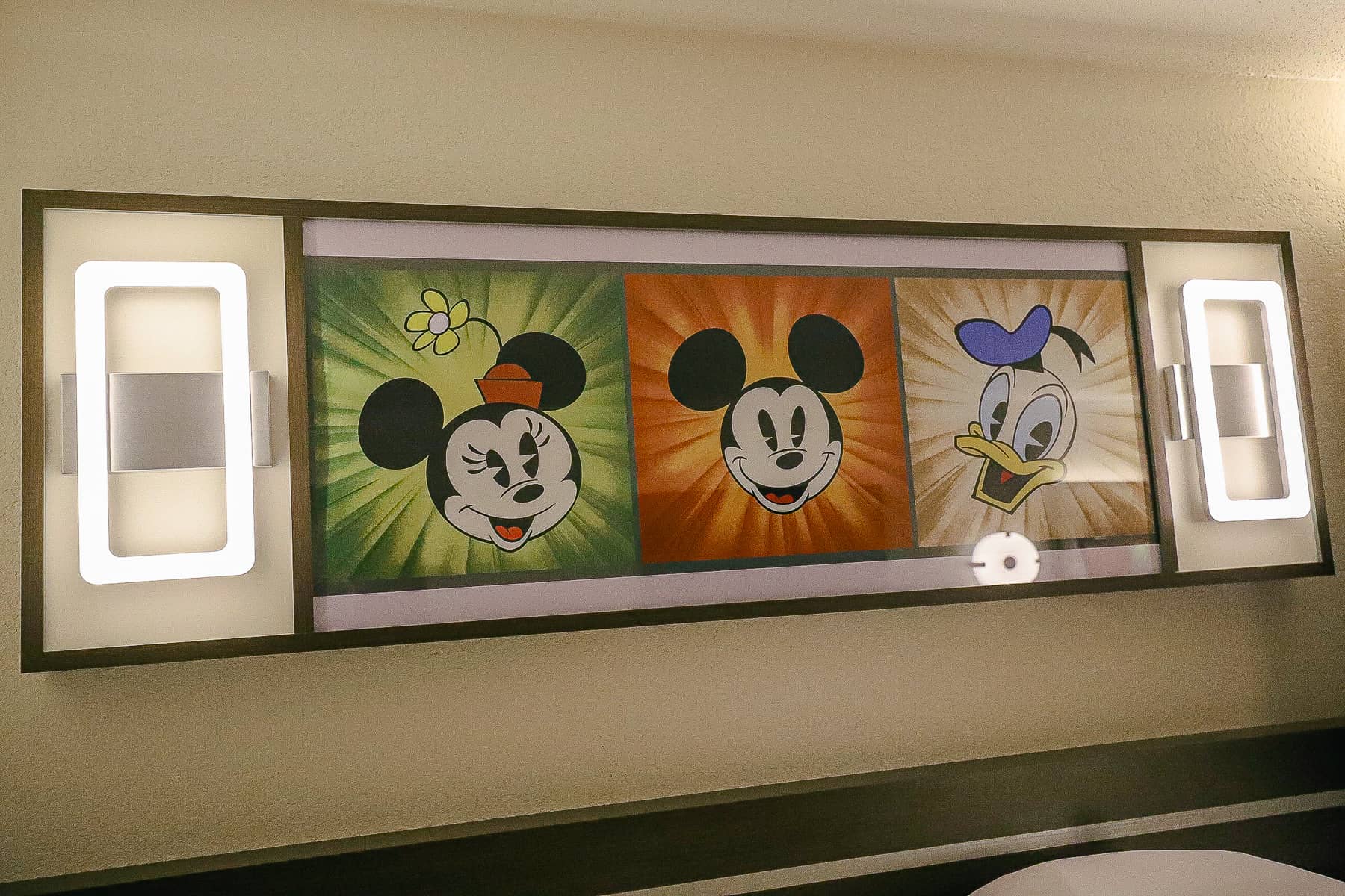 fixture over bed with Minnie Mouse, Mickey Mouse and Donald Duck 