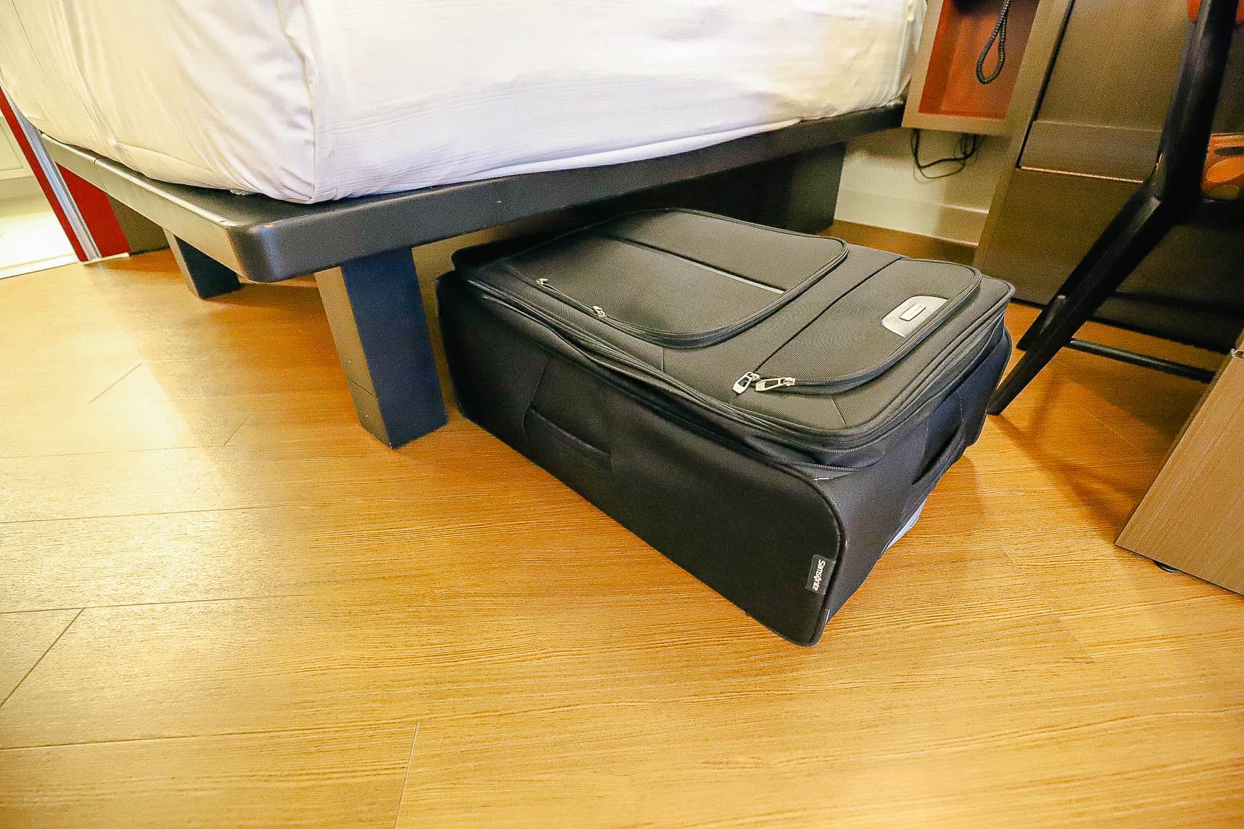 a large suitcase can slide underneath the platform bed 