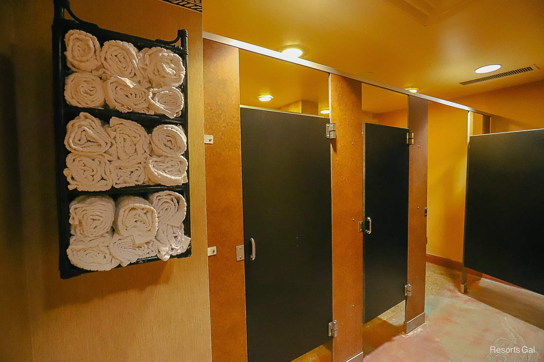 towels stacked near the pool showers at Animal Kingdom Lodge 