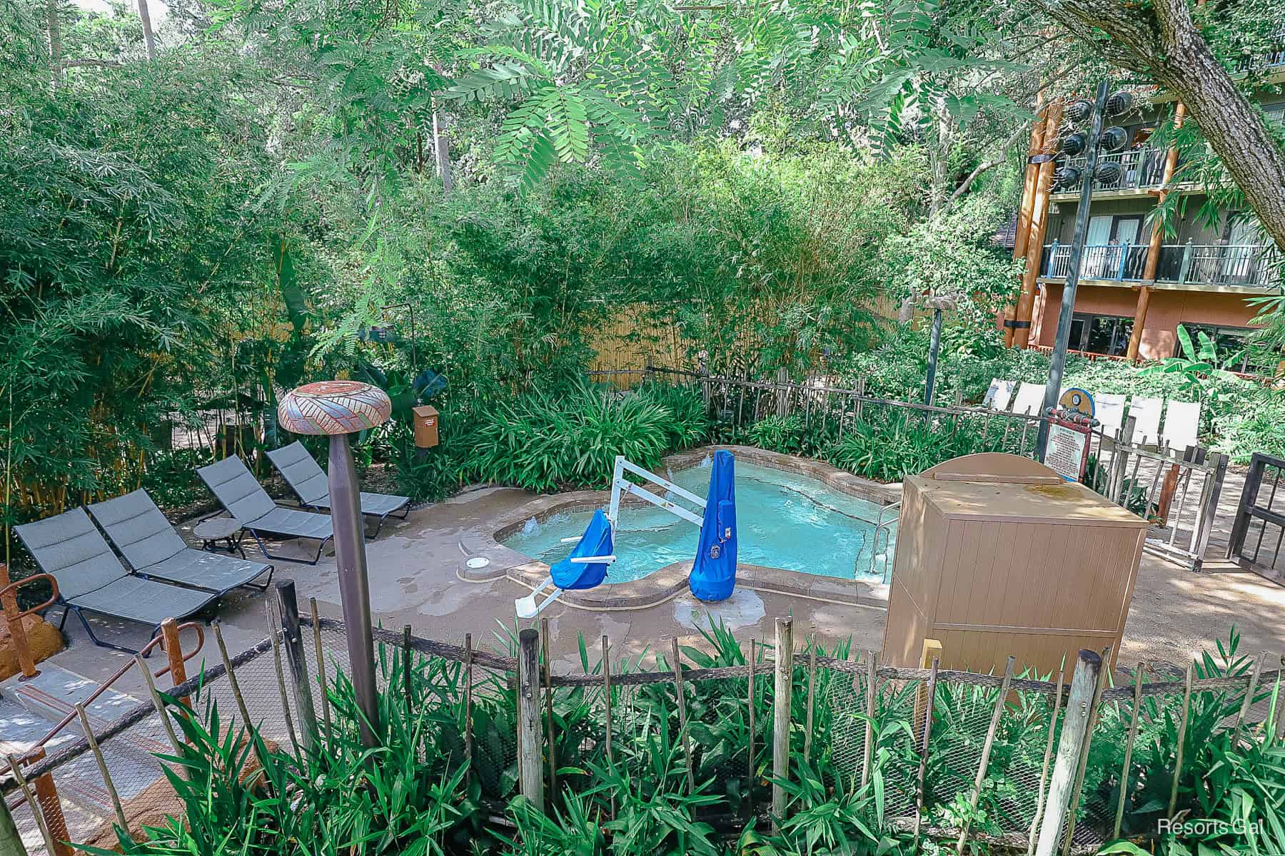 a view of the hot tub area from the waterslide platform 