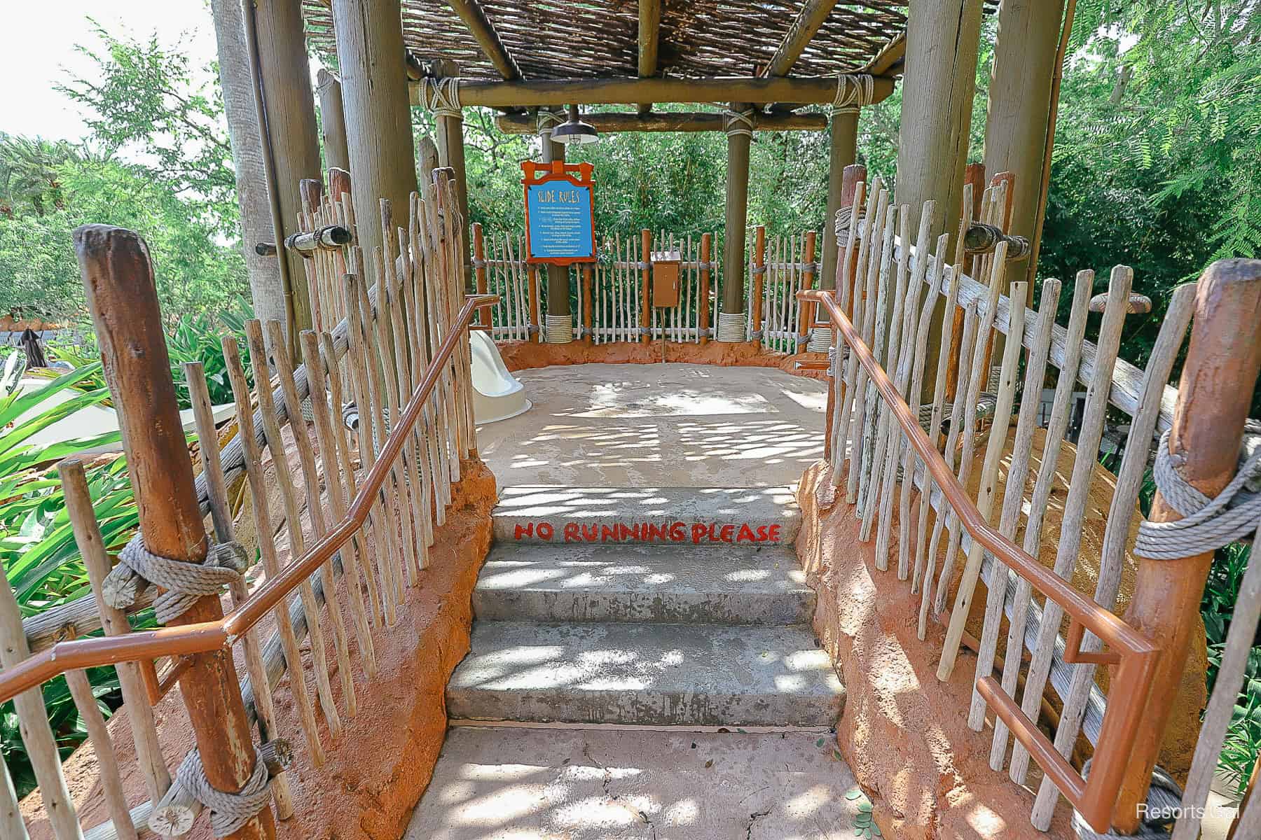 steps to the top of the platform with a stick fence on each side 