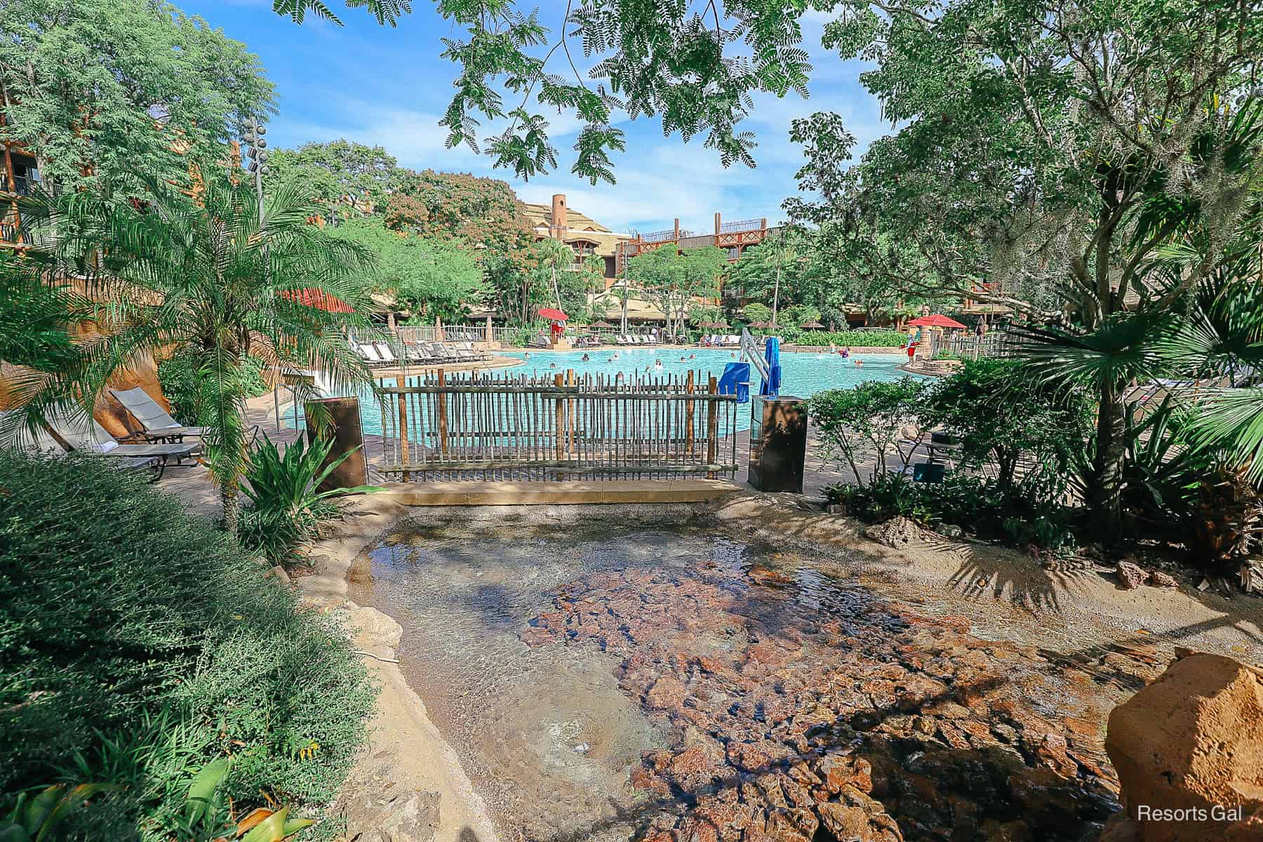 shows how the Uzima Springs is designed to look like it's flowing into the pool 