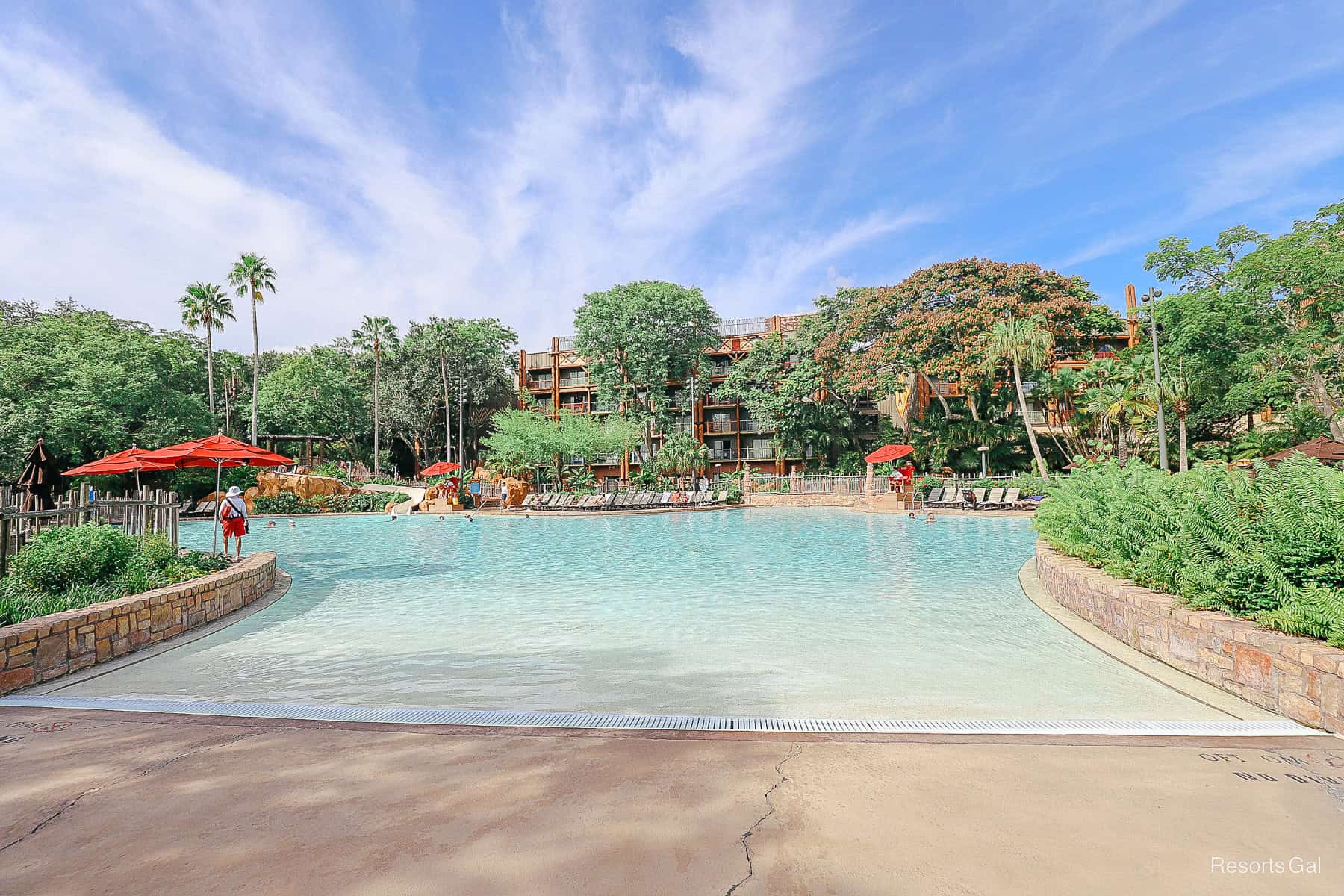 a wide view of the zero entry area with pretty blue skies backdrop 