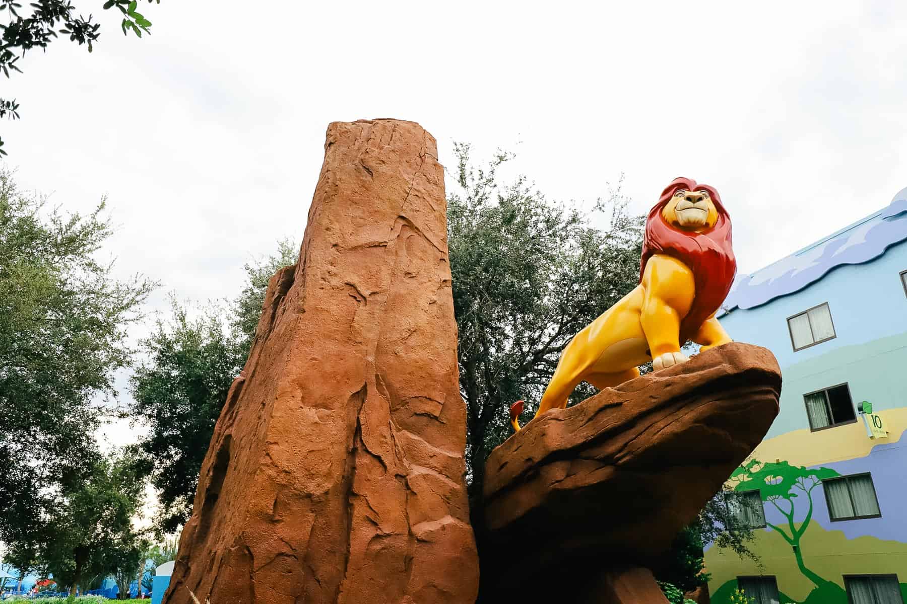 Pride Rock with Mufasa perched on top 