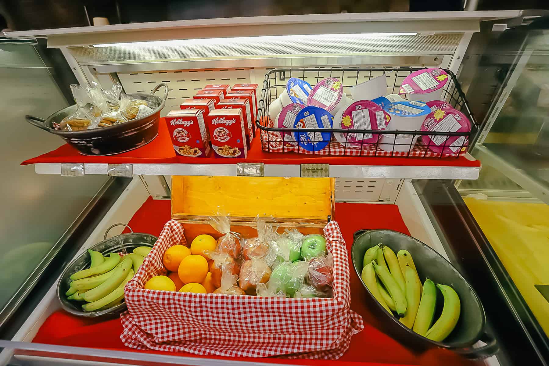 individual cups of cereal and fresh fruit 