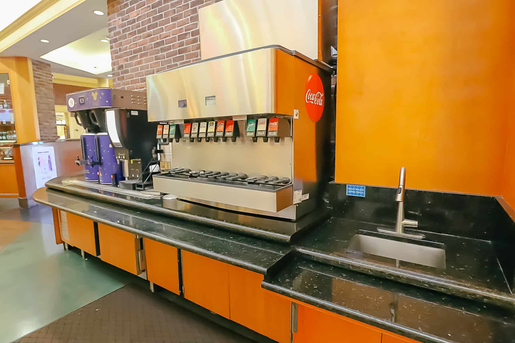 soda refill machine and sink to wash refillable mugs