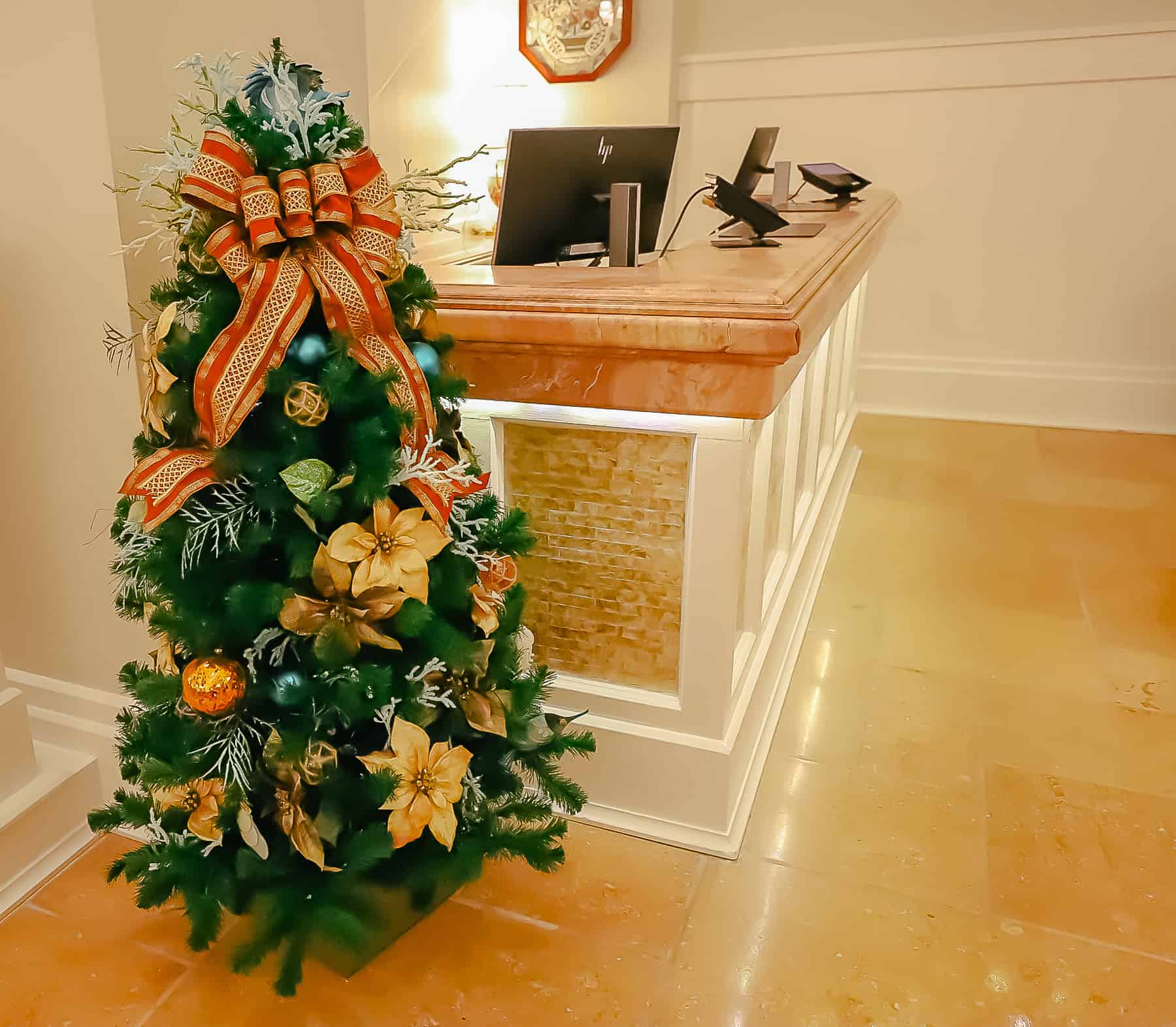 a petite Christmas tree in the lobby of Disney's Beach Club 