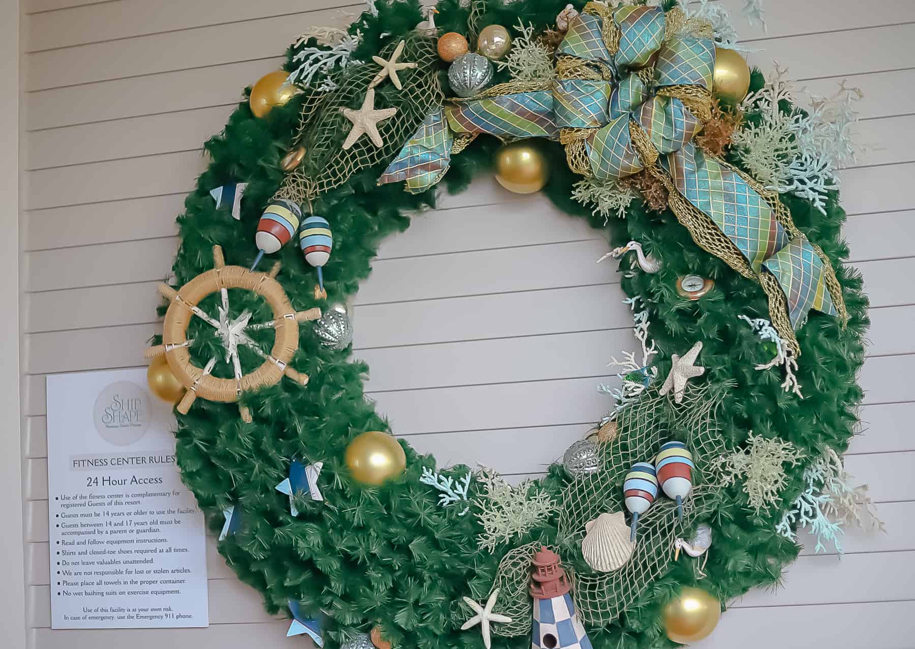 a Christmas wreath with beach decorations 