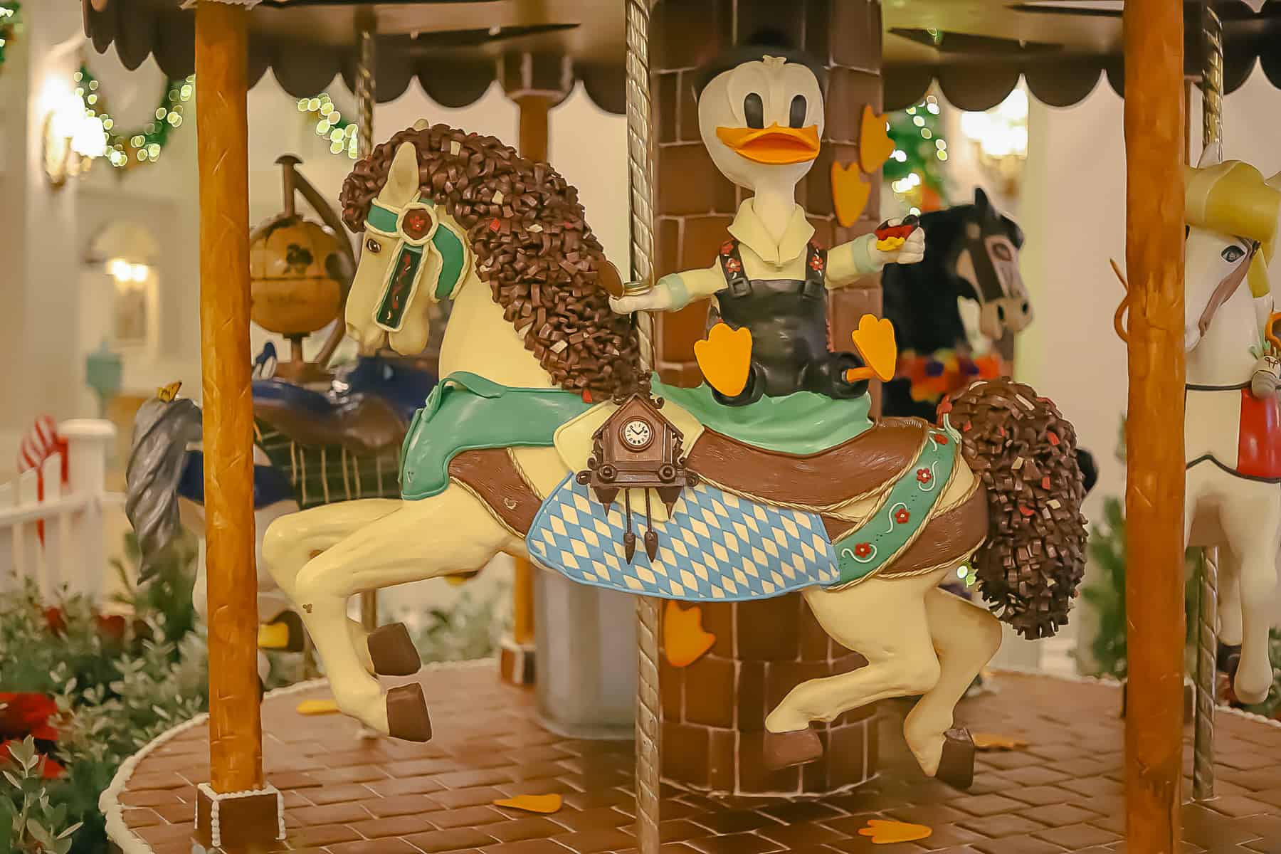 A carousel pony who has chocolate ribbons for its mane and tail. 