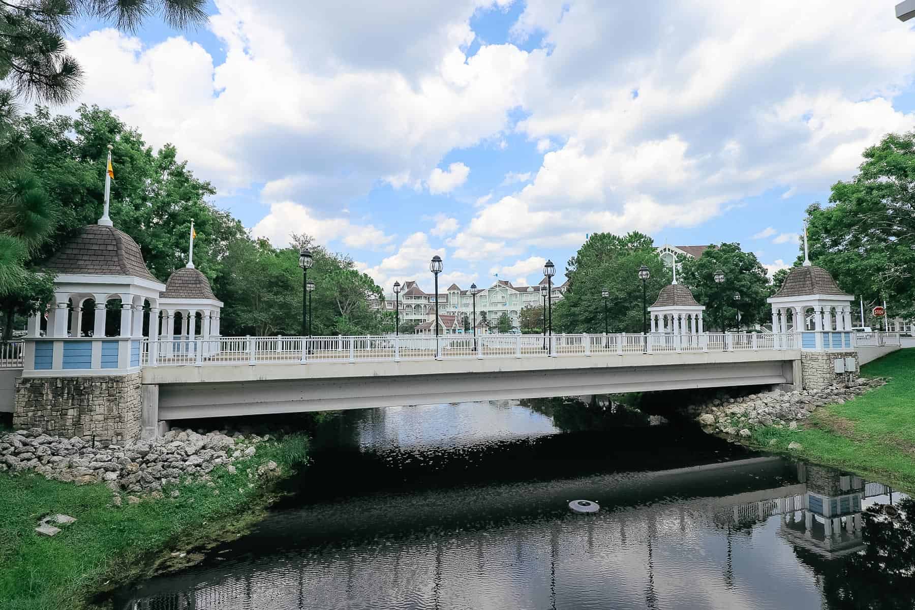 a bridge between the parking lot and main entrance of Disney's Beach Club 