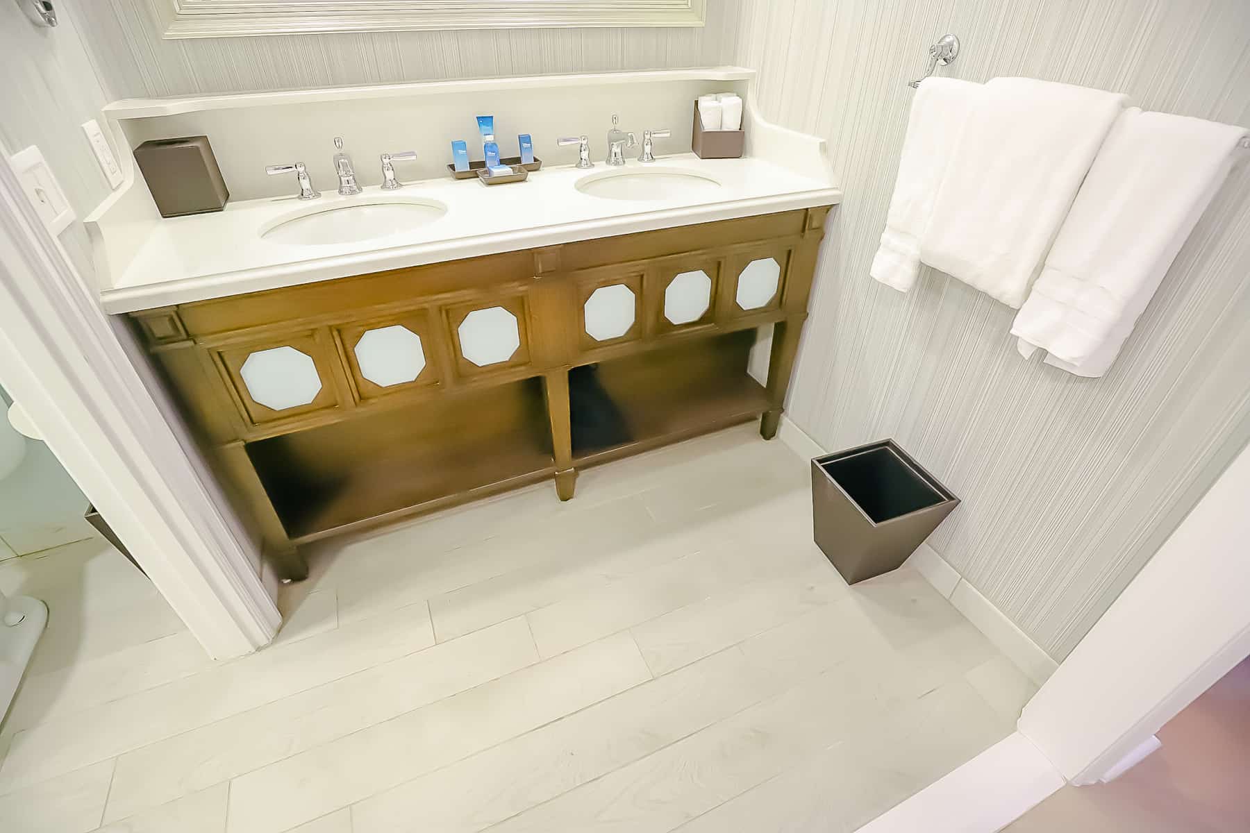 a bathroom vanity with two sinks