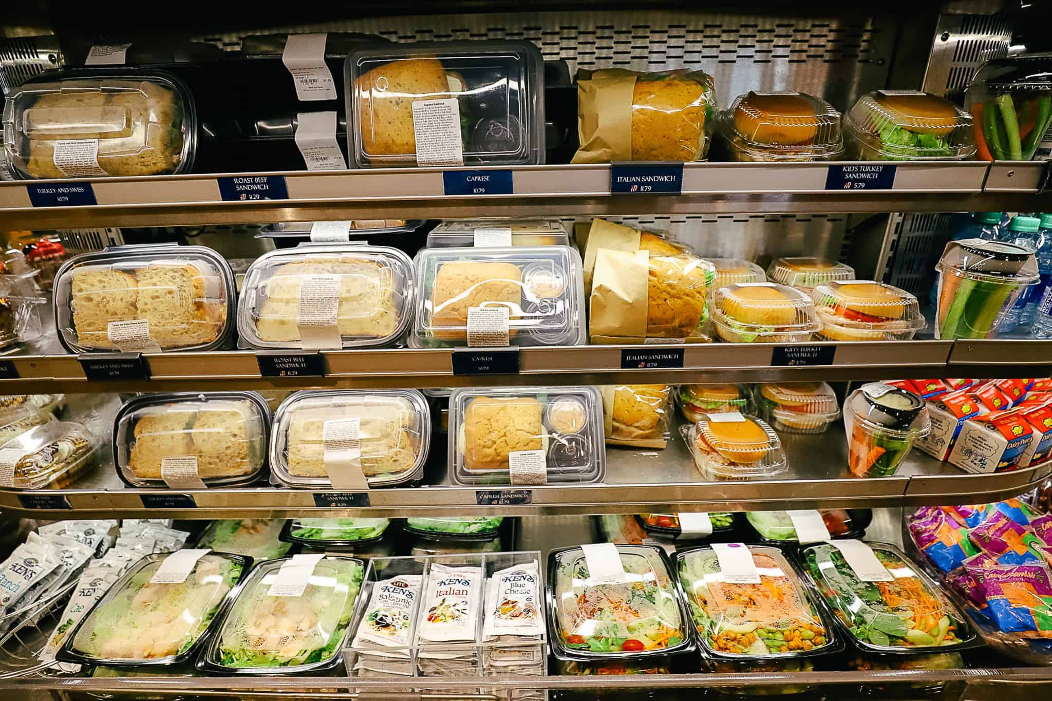 Prepackaged items in a cooler that sits in the middle of Beach Club Marketplace. 