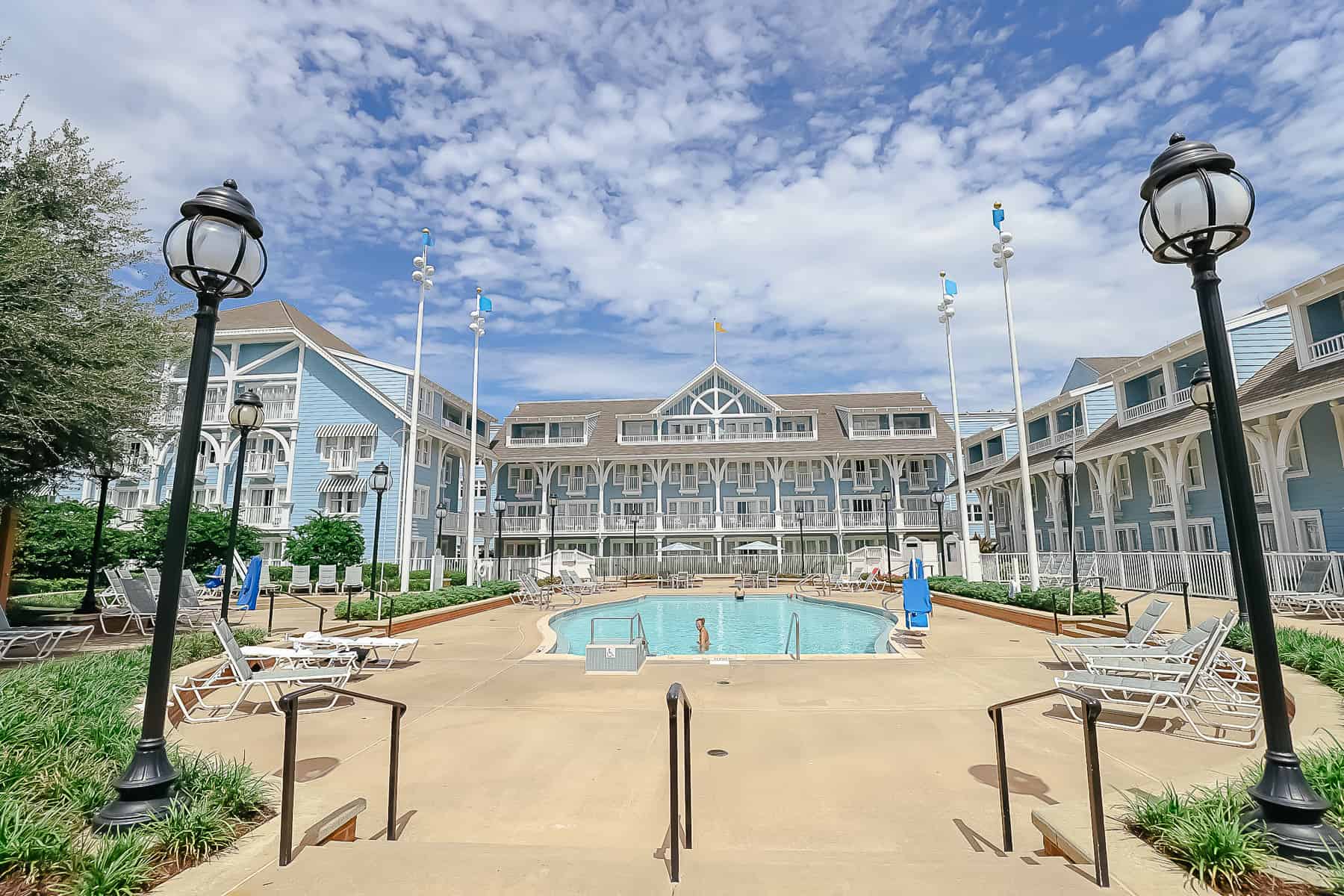 a quiet pool at Beach Club with the resort in the background 