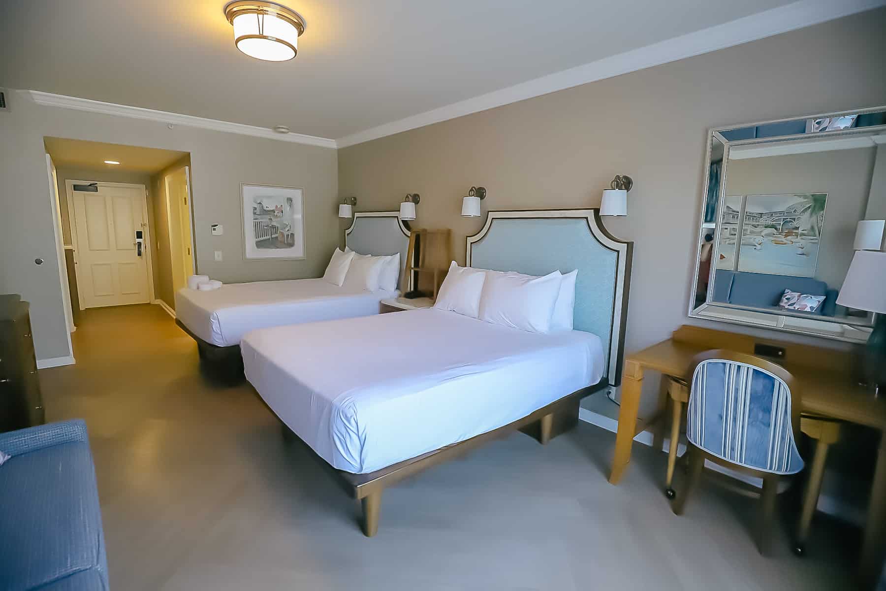 a room at Beach Club on the club level floor with two queen beds 