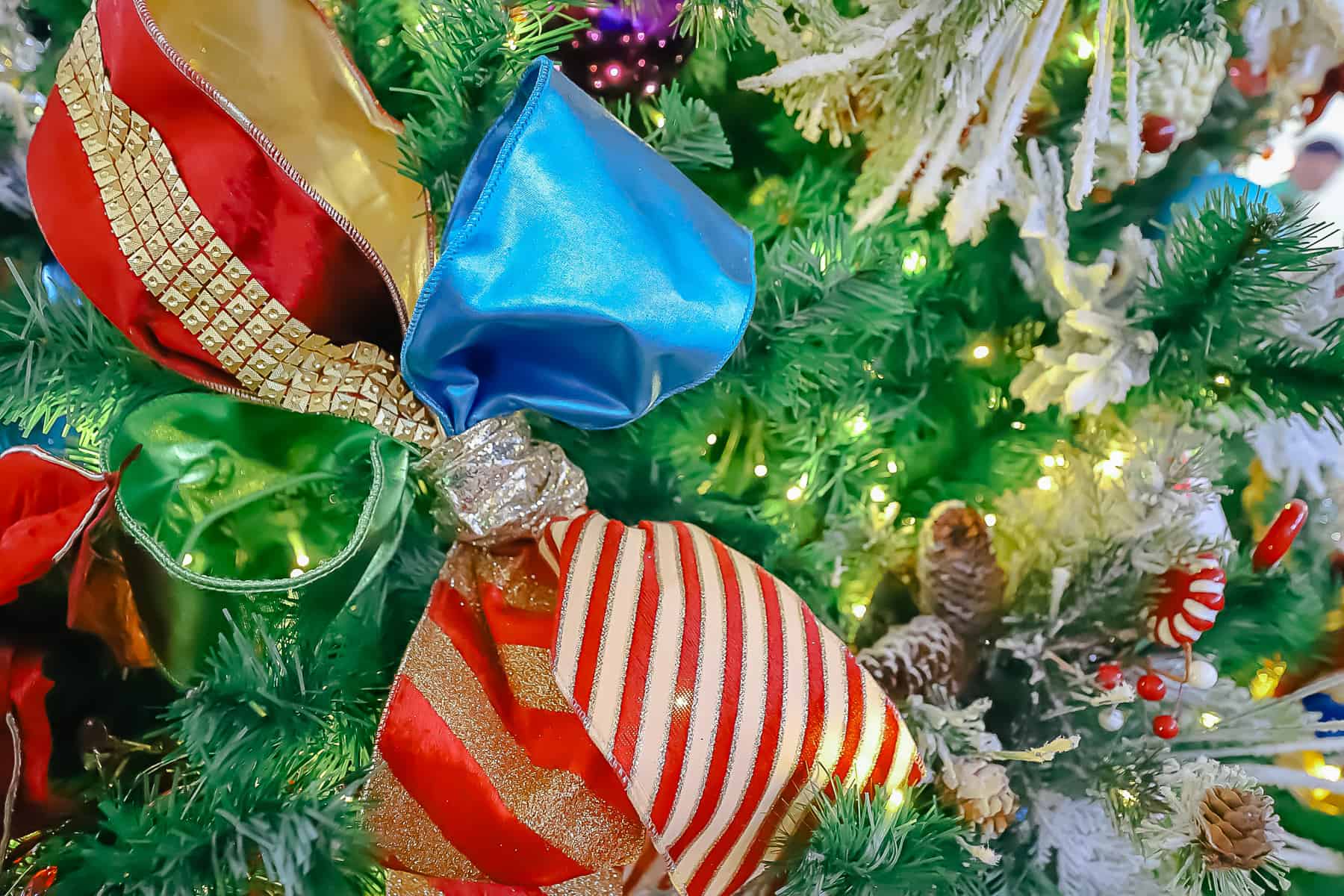 a Christmas bow tied on the tree 