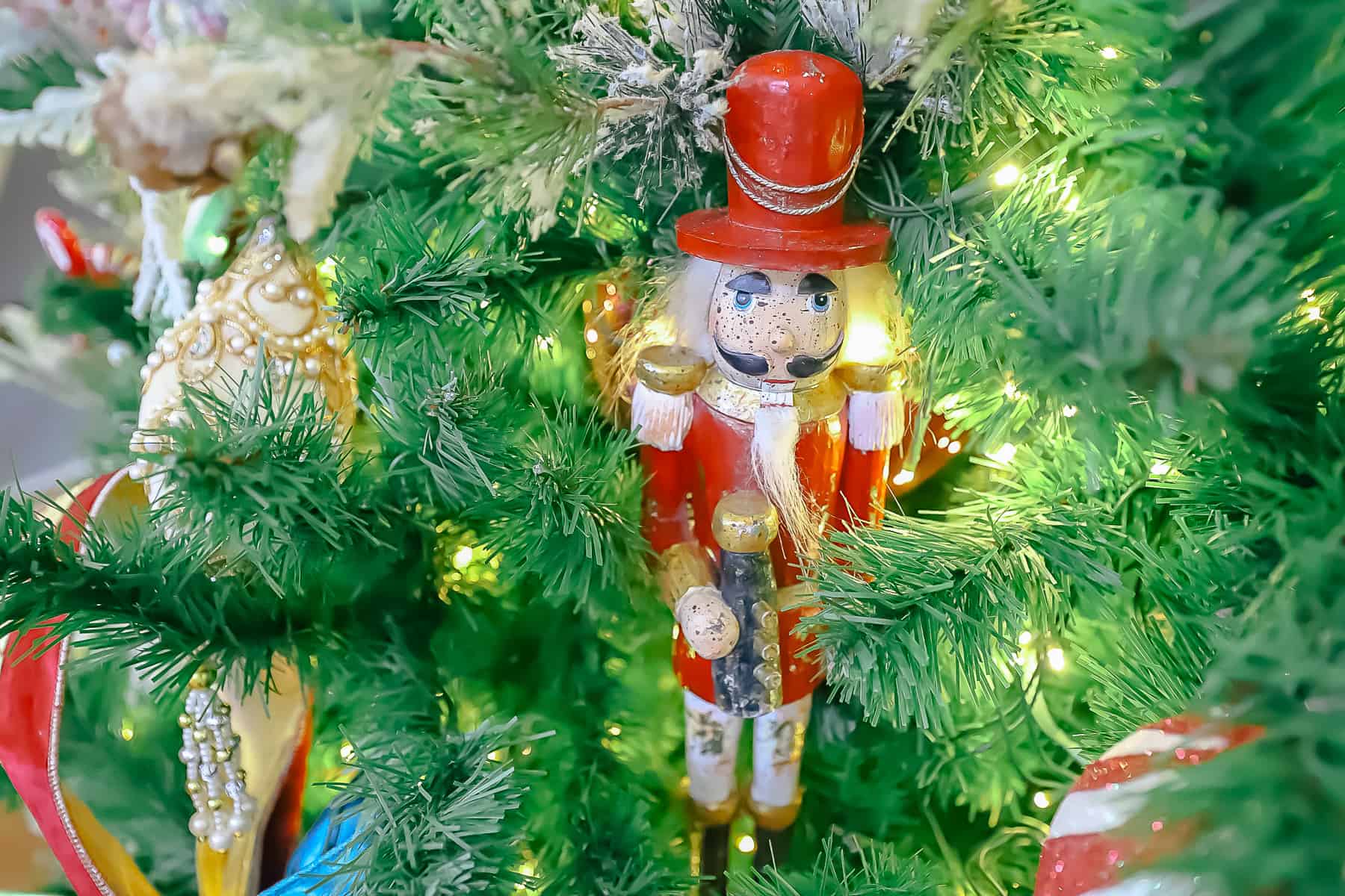 a nutcracker ornament on the lobby tree at Disney's Boardwalk 