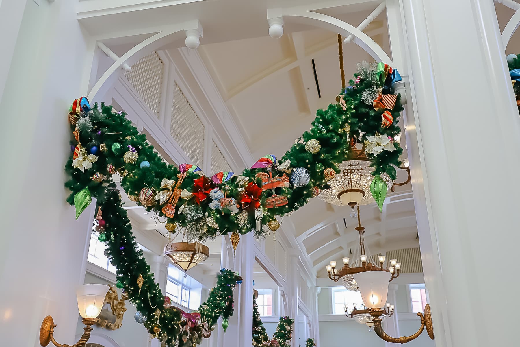 swags of garland hung in the lobby of Disney's Boardwalk at Christmas 