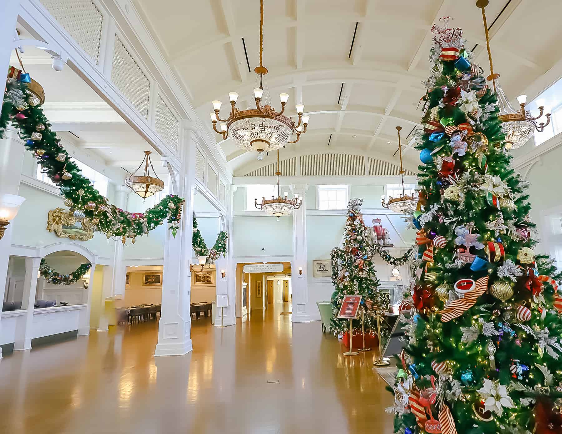 a photo of the entire lobby of Disney's Boardwalk at Christmas 