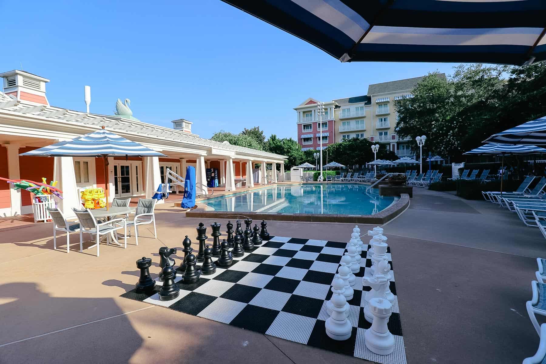 an outdoor chess game in black and white 