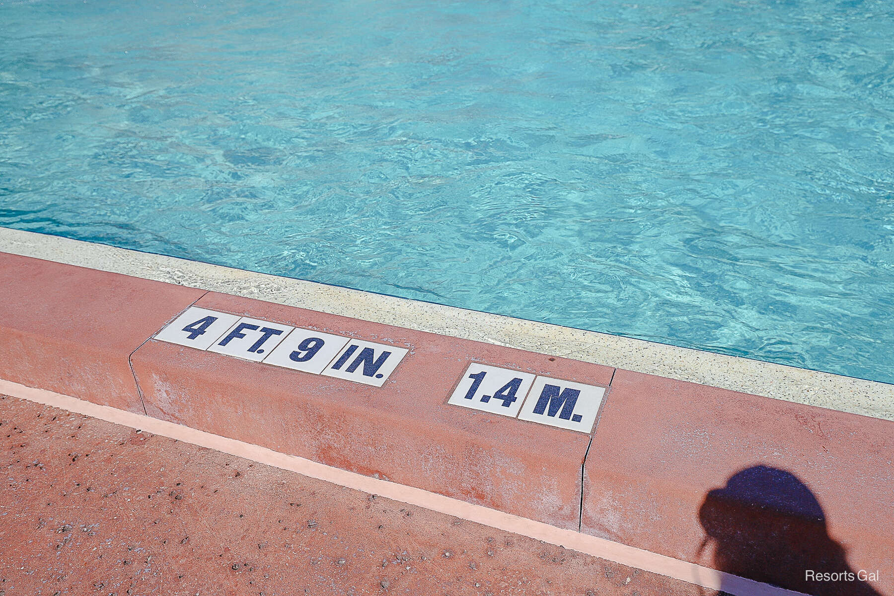 the pool depth s printed on the edge of the pool 