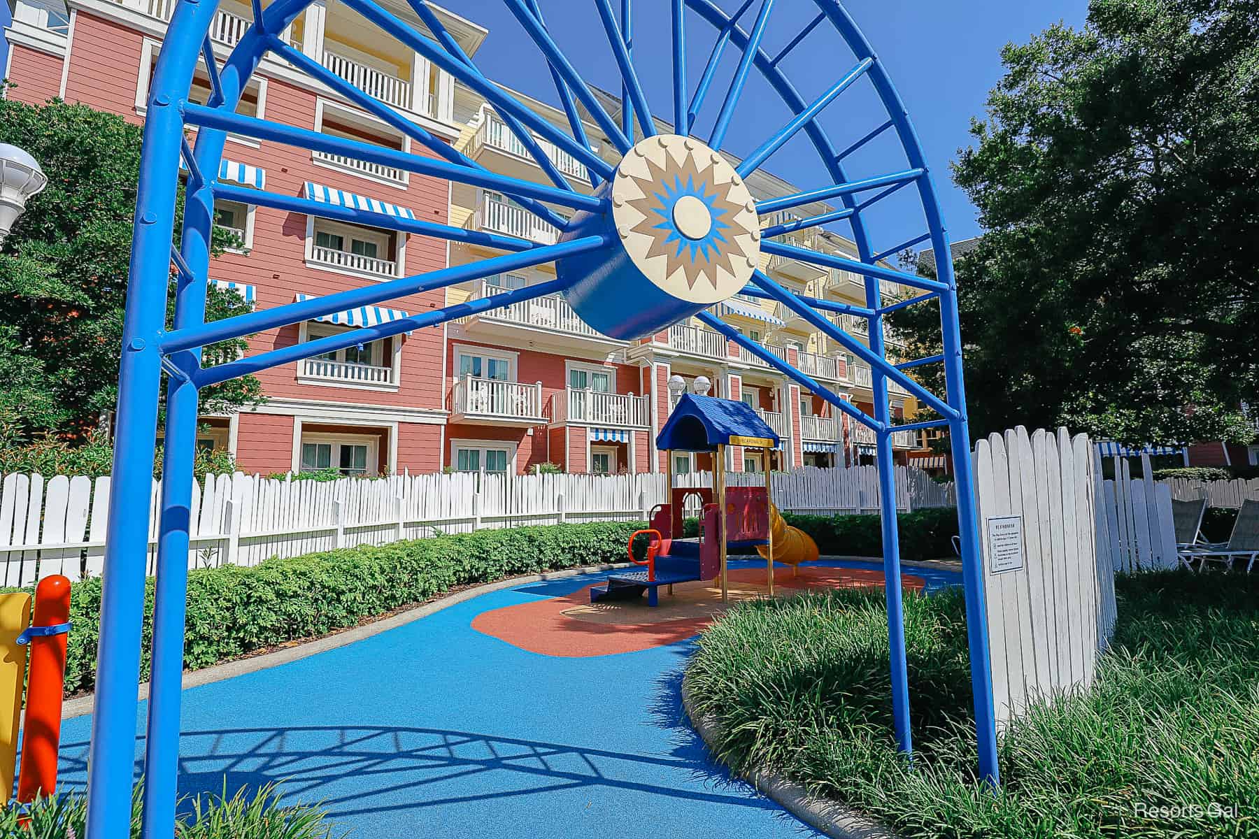 an entrance to a children's play area near the pool 