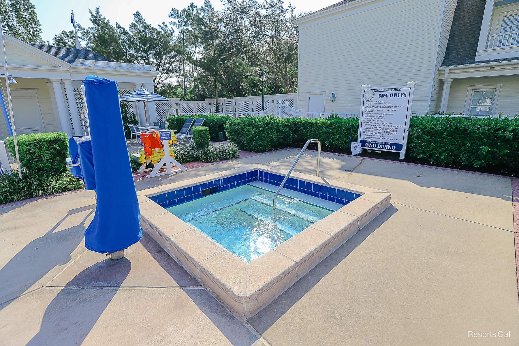 a whirlpool spa with a square shape at the Boardwalk Inn's quiet pool 